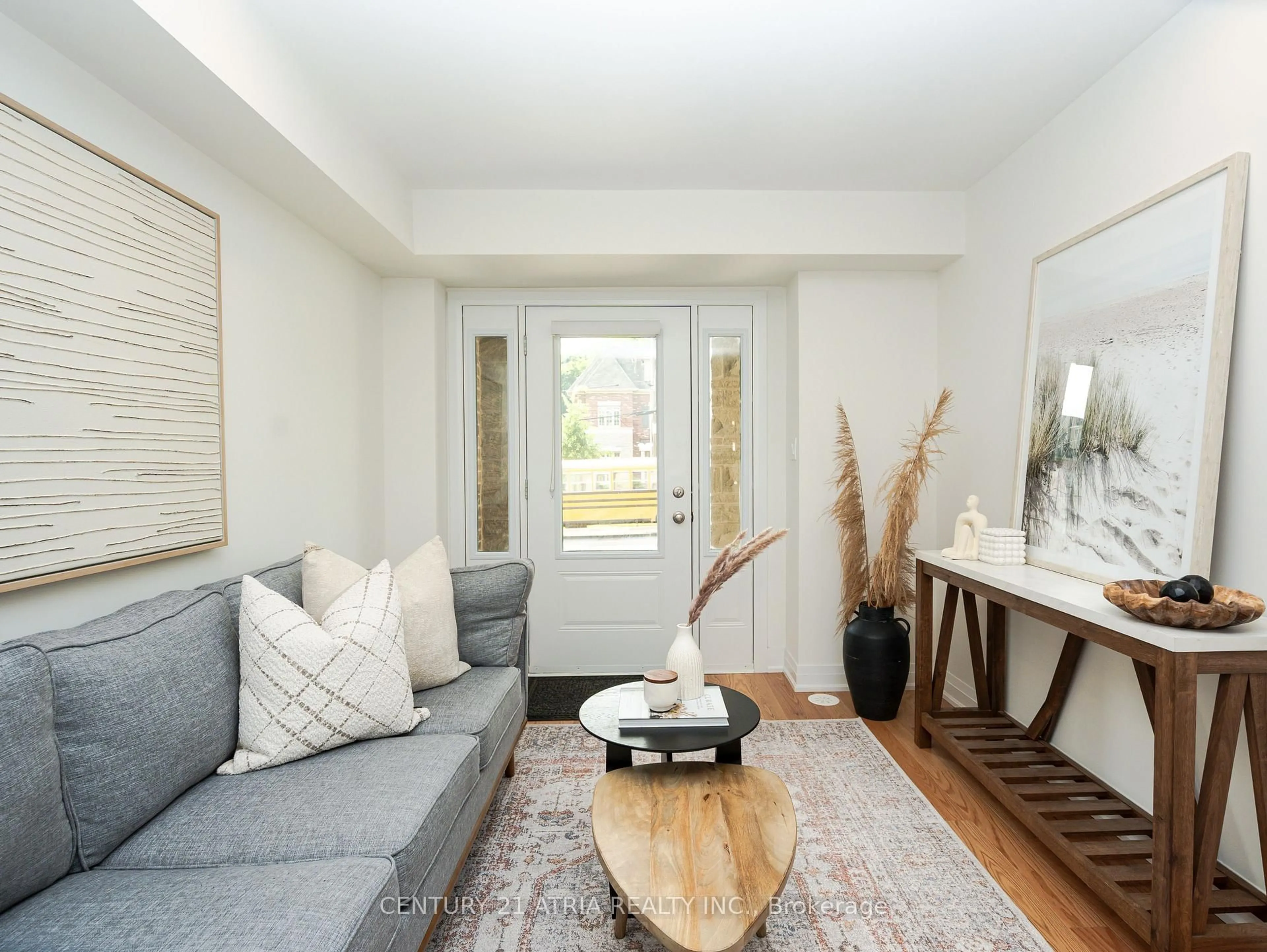 Living room with furniture, wood/laminate floor for 38 Main St, Mississauga Ontario L5M 1X8