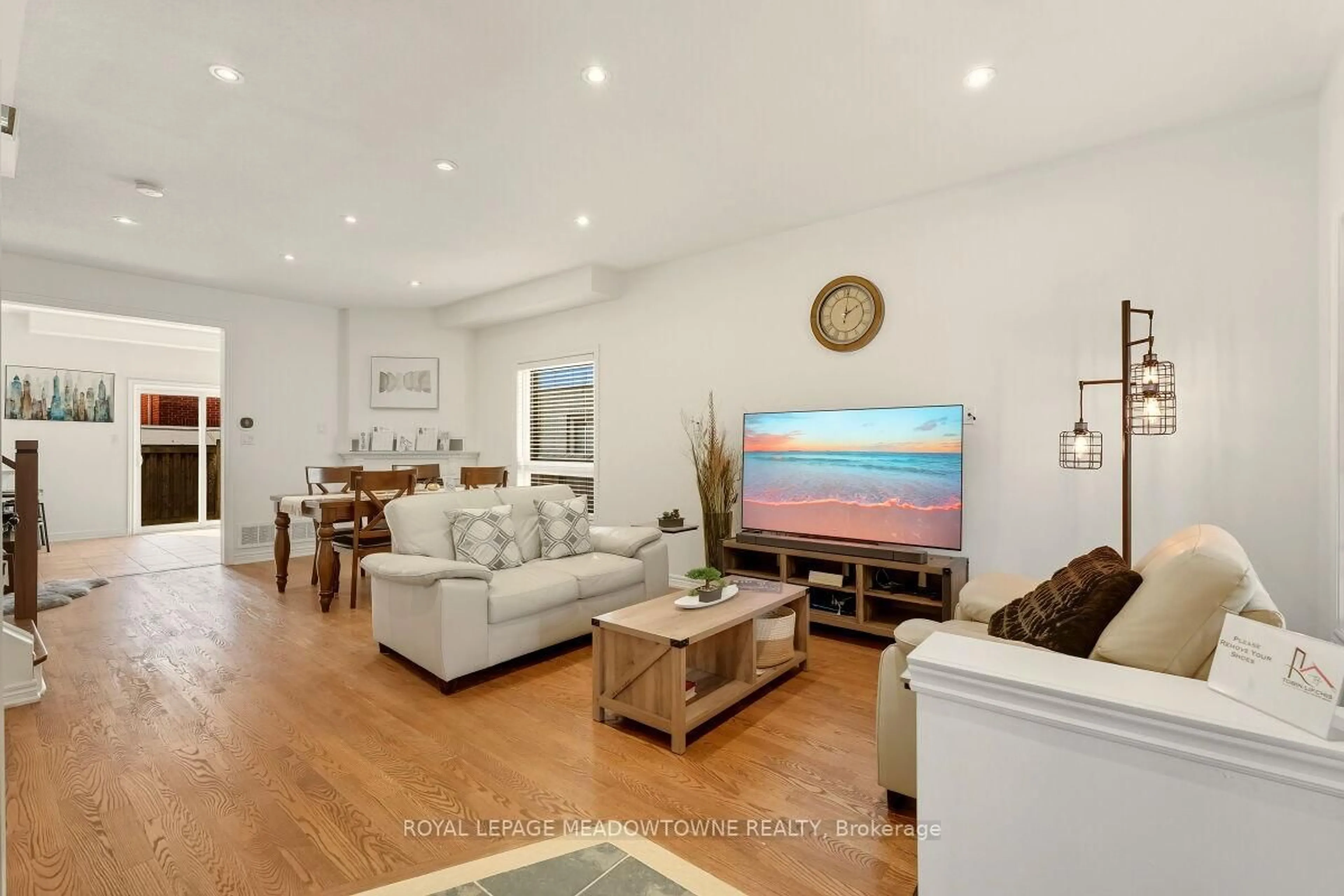 Living room with furniture, wood/laminate floor for 304 Teetzel Dr, Milton Ontario L9T 0B1