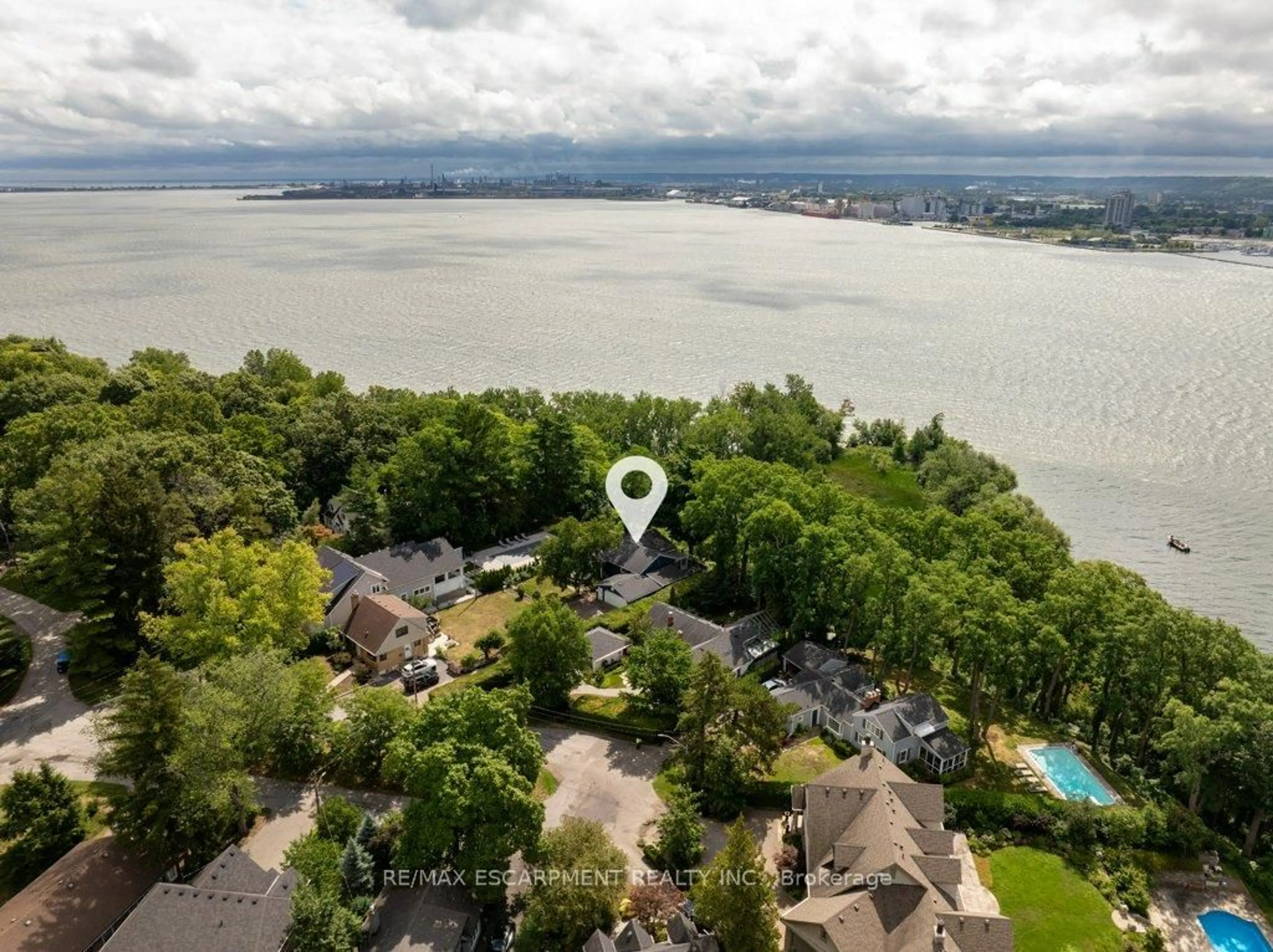 A pic from outside/outdoor area/front of a property/back of a property/a pic from drone, water/lake/river/ocean view for 636 West Oval Dr, Burlington Ontario L7T 1B9