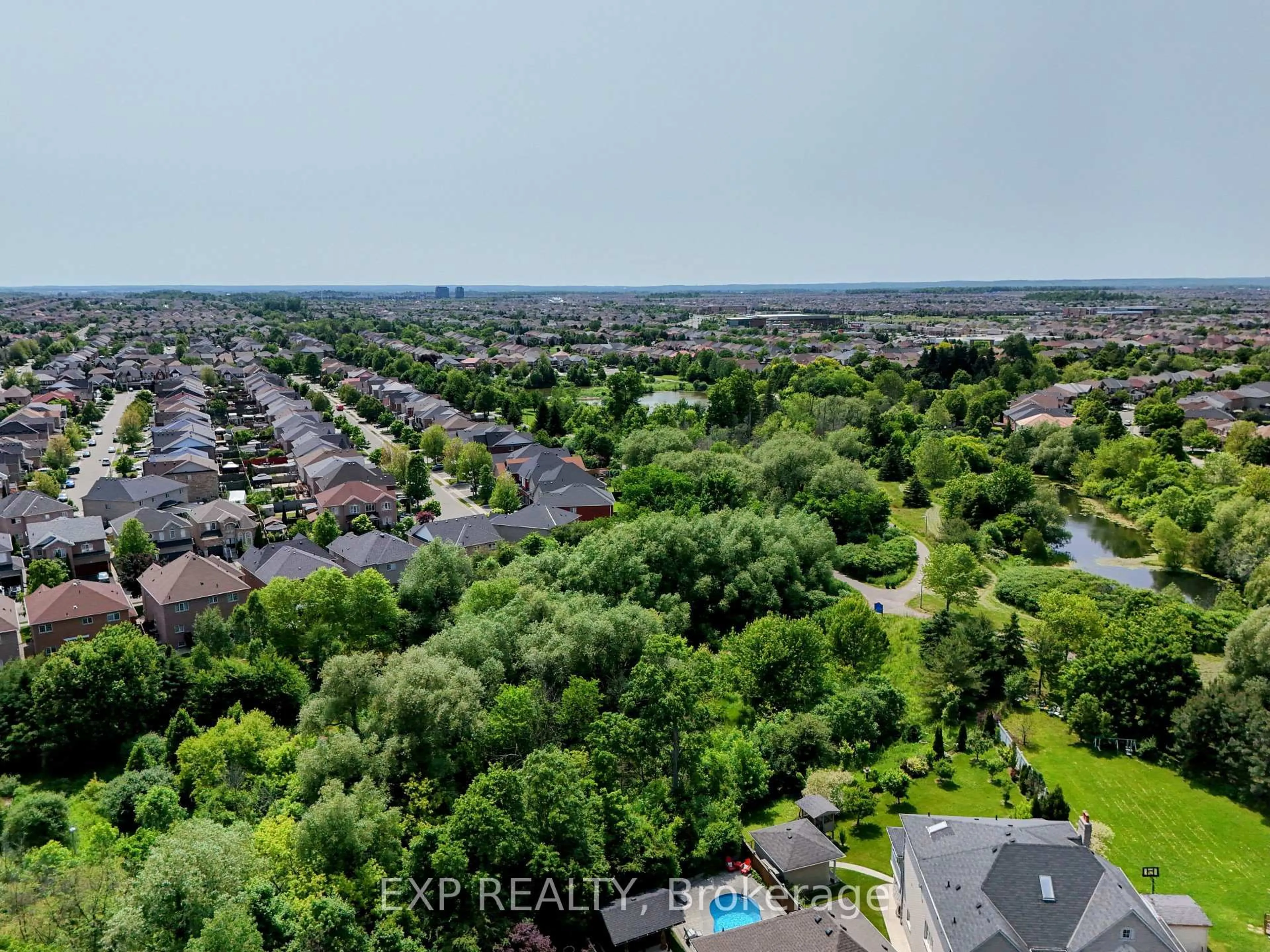 A pic from outside/outdoor area/front of a property/back of a property/a pic from drone, city buildings view from balcony for 100 Dells Cres, Brampton Ontario L7A 2X1