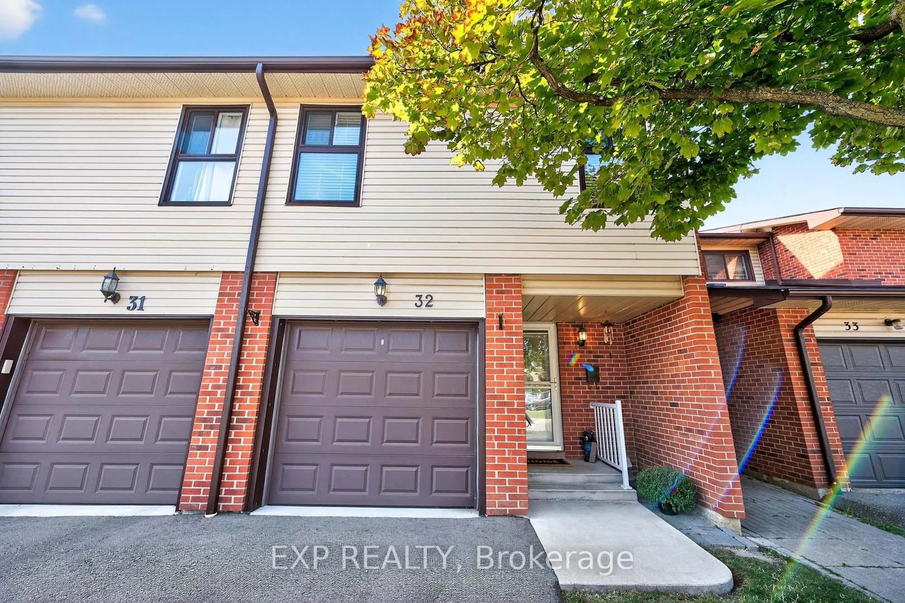 Home with brick exterior material, street for 32 Collins Cres, Brampton Ontario L6V 3M9