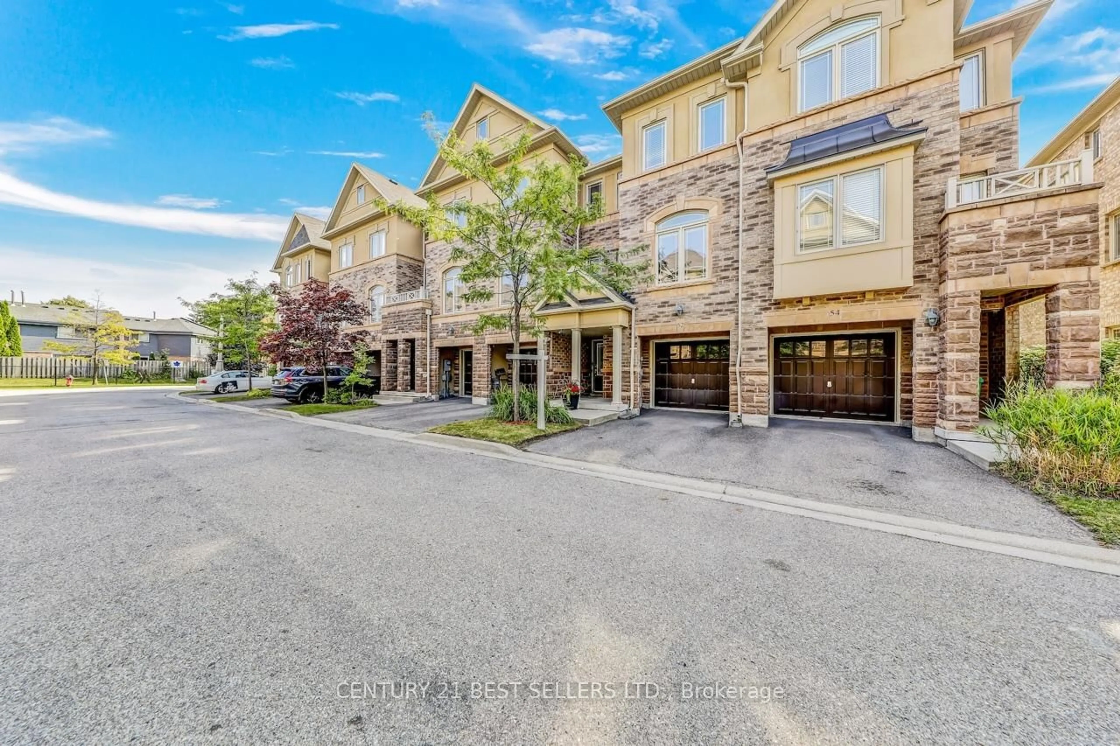 A pic from outside/outdoor area/front of a property/back of a property/a pic from drone, street for 6625 Falconer Dr #52, Mississauga Ontario L5N 0C7