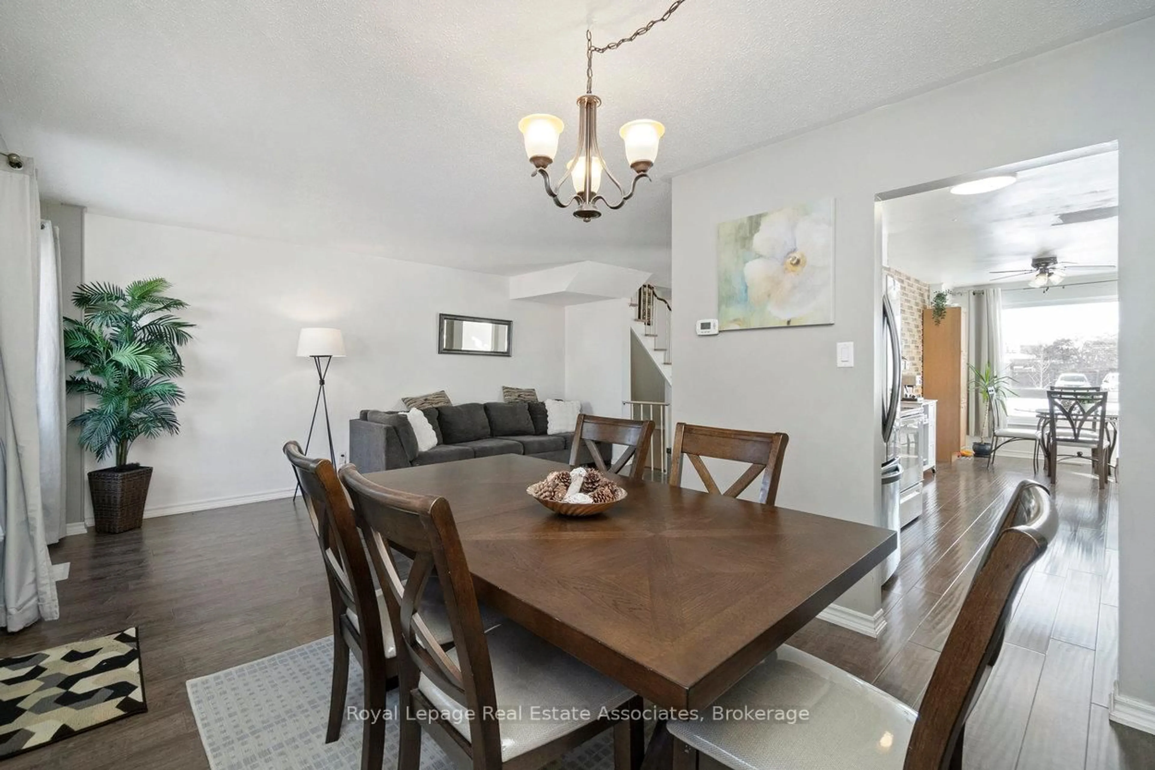 Dining room, wood/laminate floor for 44 Village Crt #22, Brampton Ontario L6W 1A6