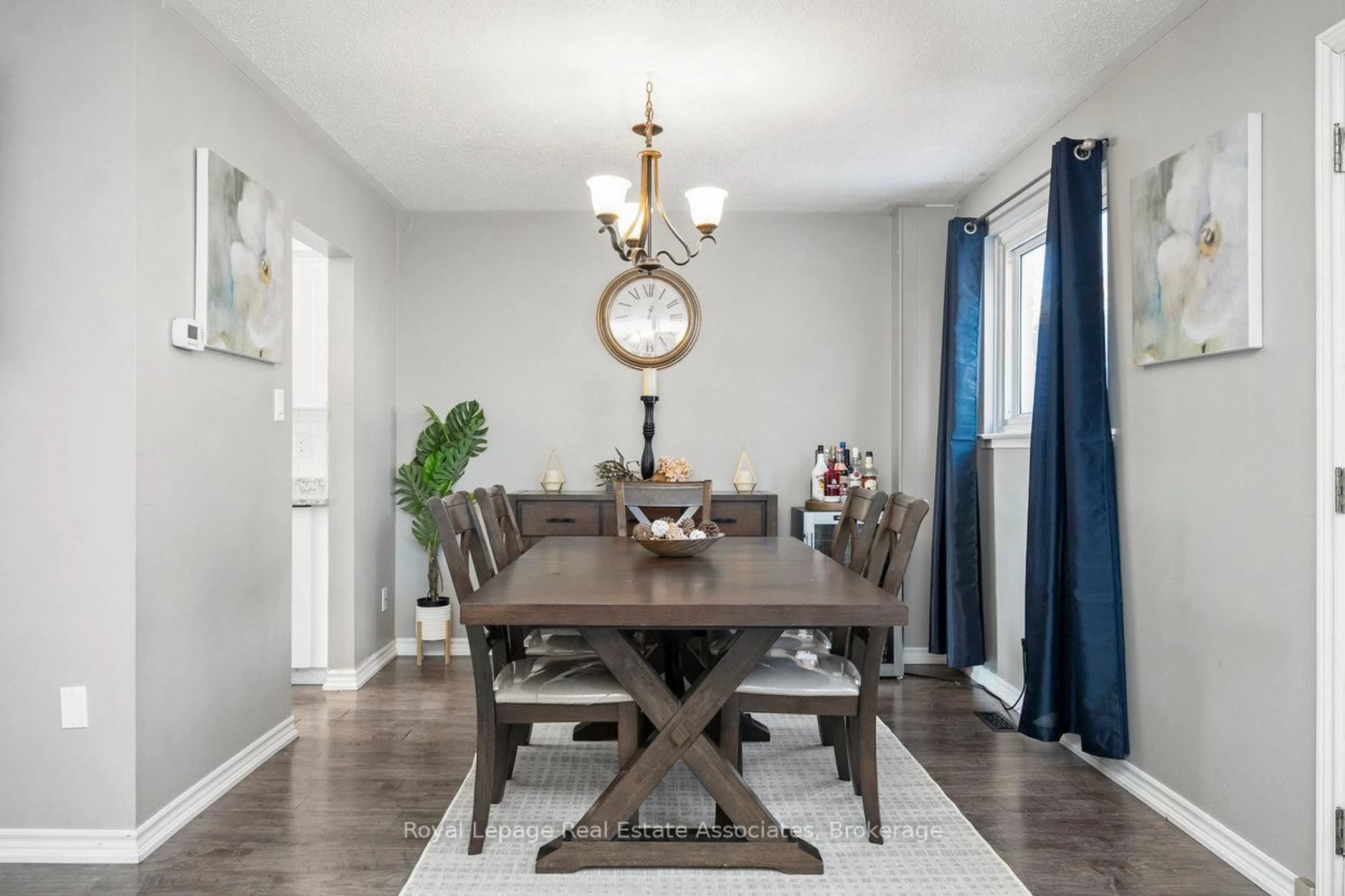 Dining room, wood/laminate floor for 44 Village Crt #22, Brampton Ontario L6W 1A6