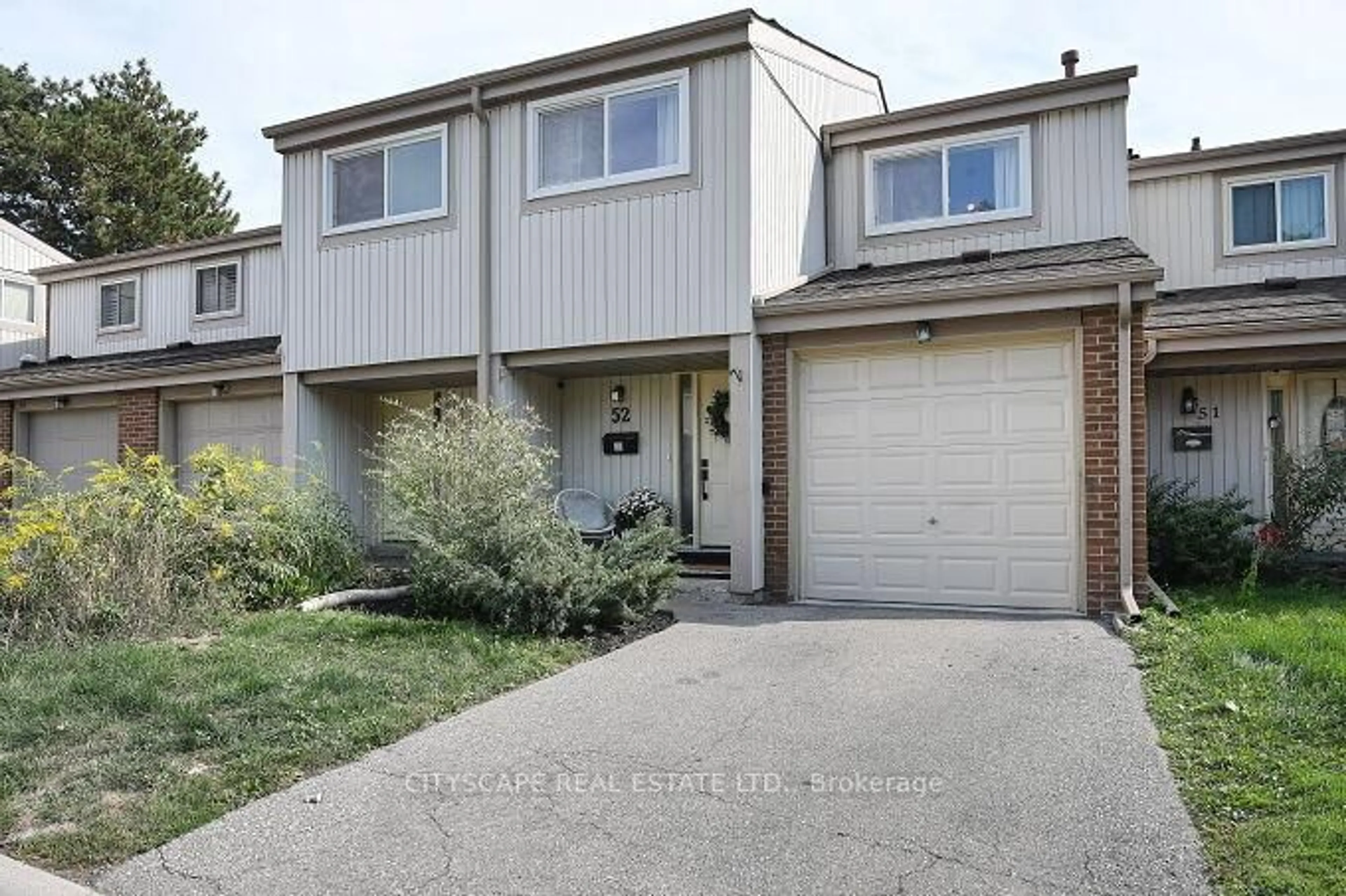 Home with vinyl exterior material, street for 3339 Council Ring Rd #52, Mississauga Ontario L5L 2A9