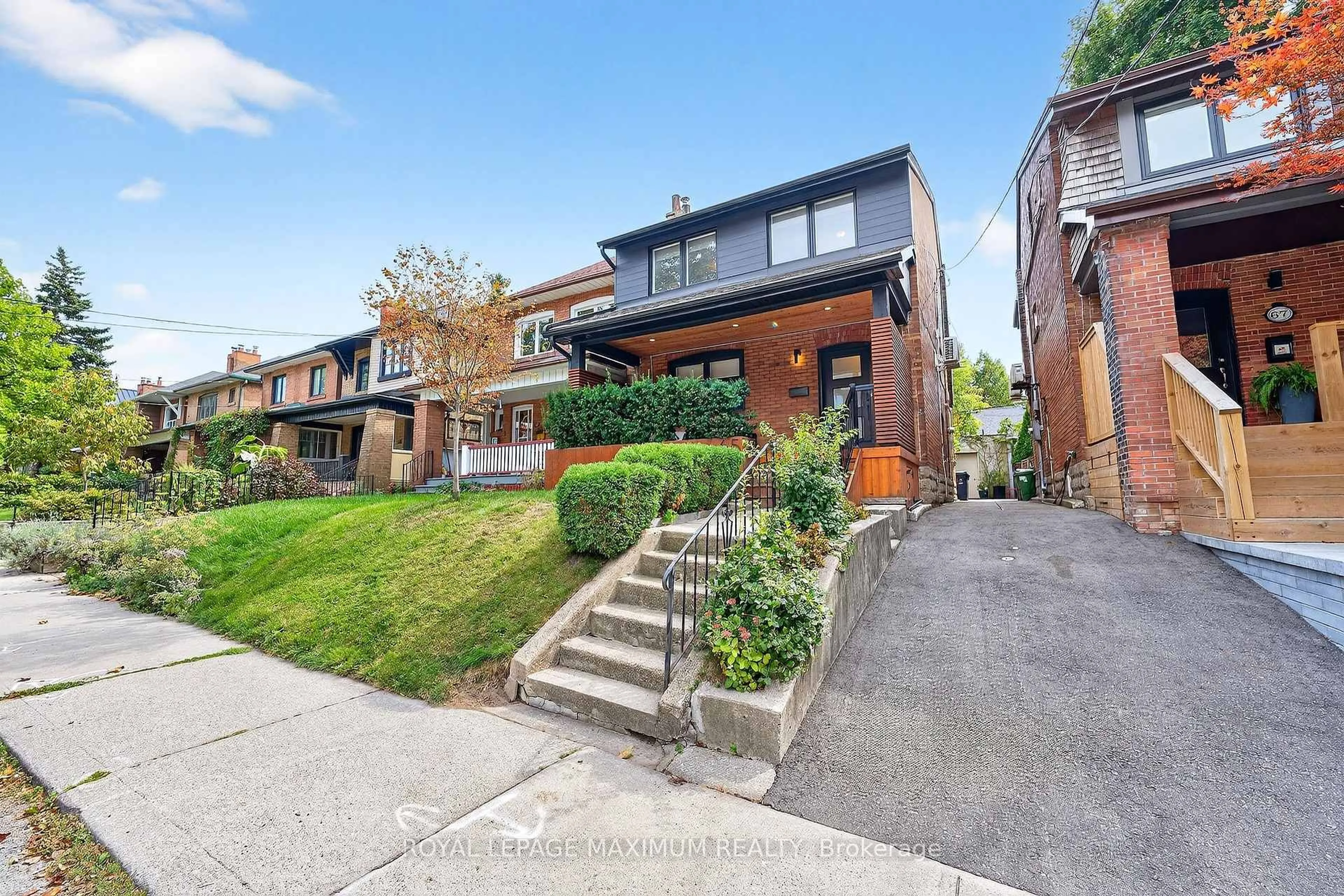 Home with brick exterior material, street for 65 Parkdale Rd, Toronto Ontario M6R 1E3
