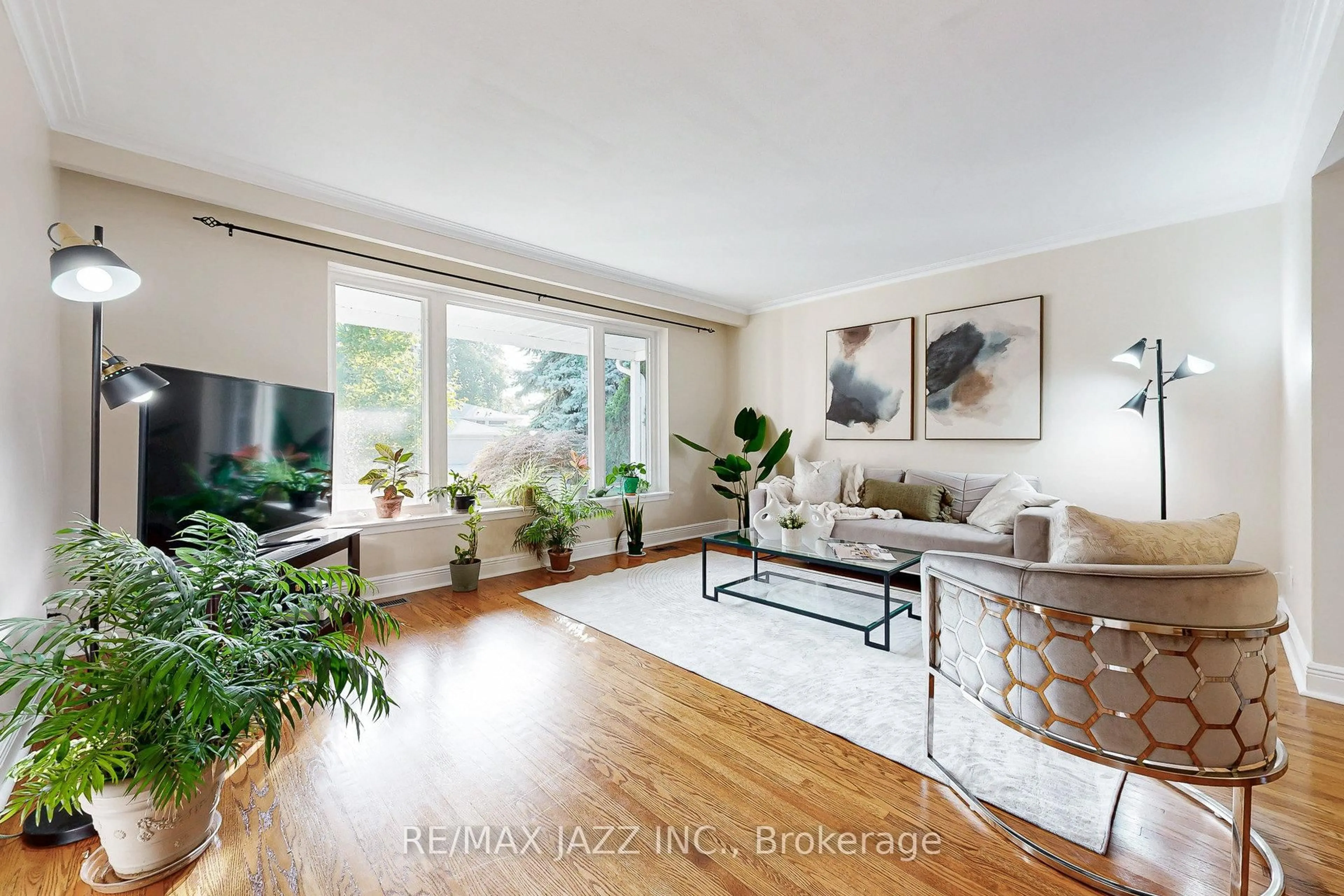 Living room with furniture, wood/laminate floor for 43 Kingsborough Cres, Toronto Ontario M9R 2T8