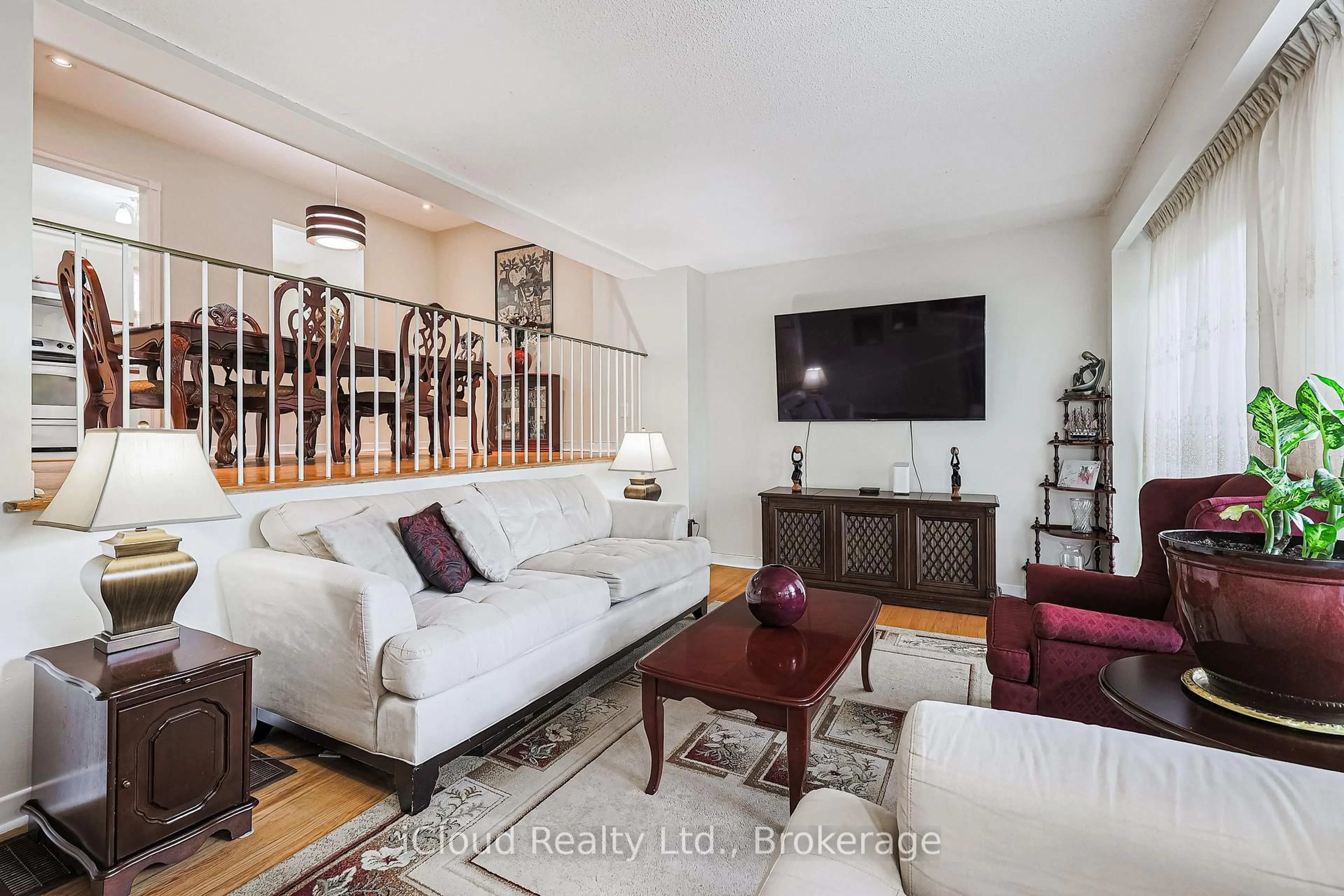 Living room with furniture, wood/laminate floor for 1667 Albion Rd #53, Toronto Ontario M9V 1B7