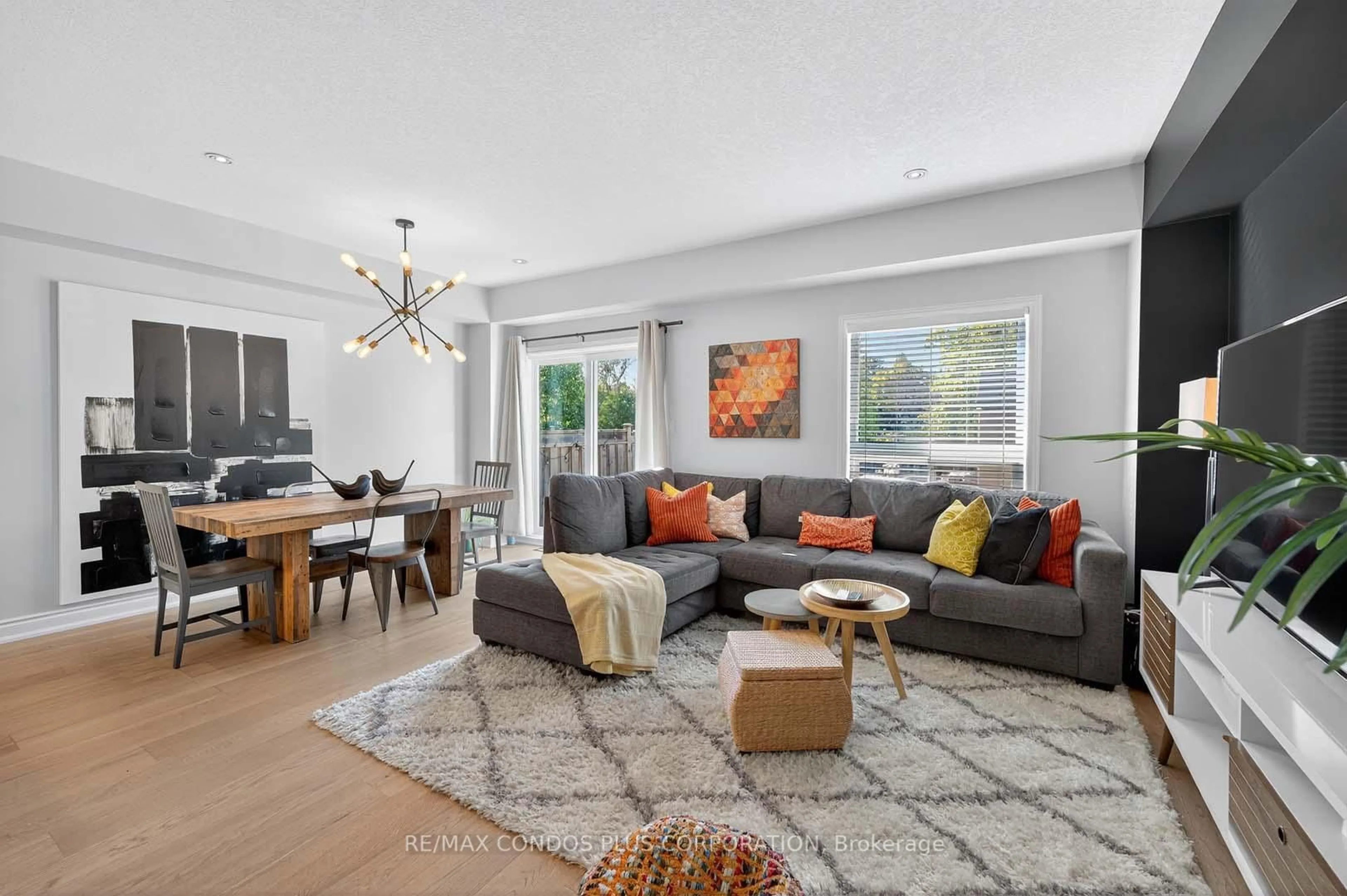 Living room with furniture, unknown for 1491 Plains Rd #4, Burlington Ontario L7T 4H1