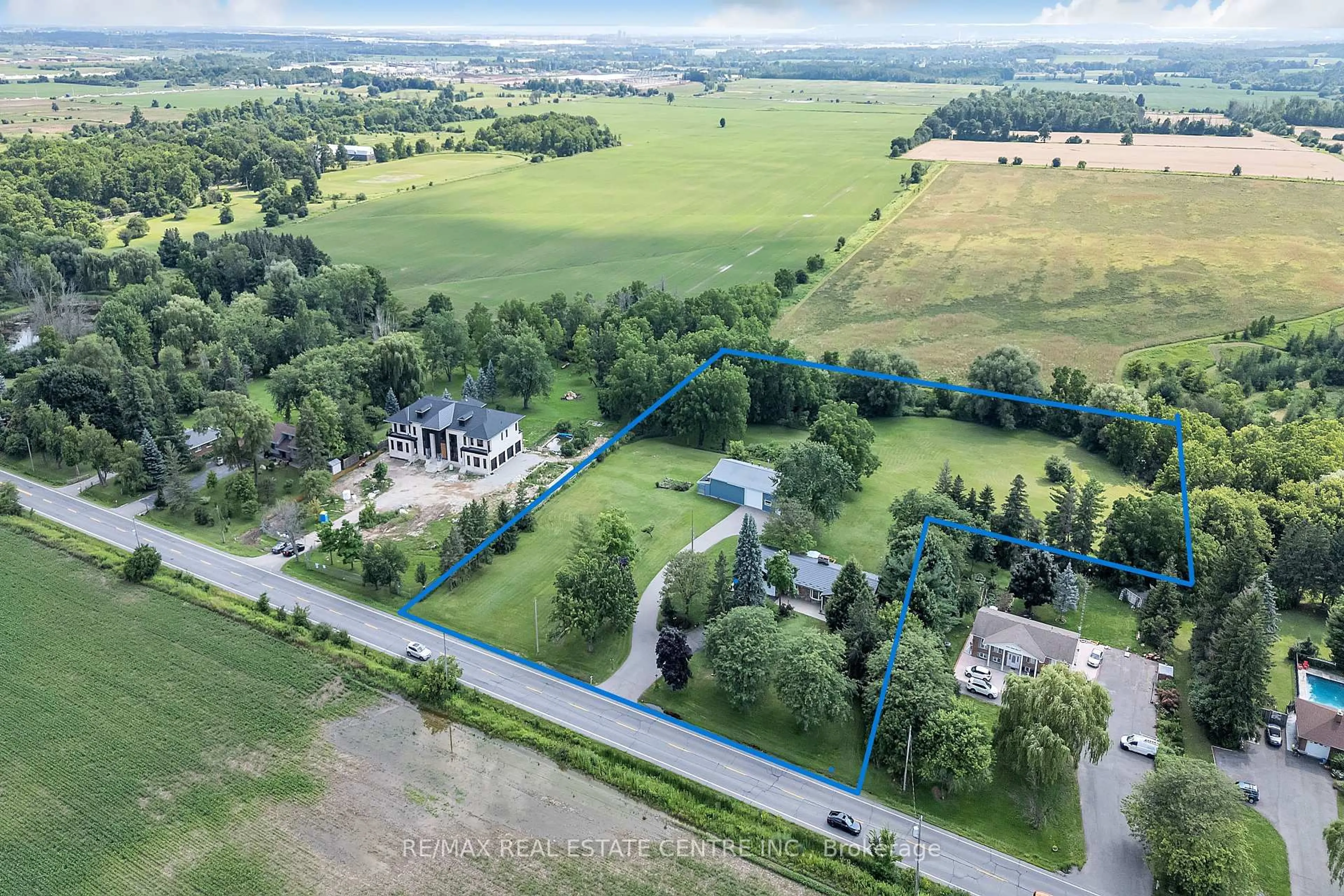 A pic from outside/outdoor area/front of a property/back of a property/a pic from drone, unknown for 8438 Ninth Line, Halton Hills Ontario L0P 1K0