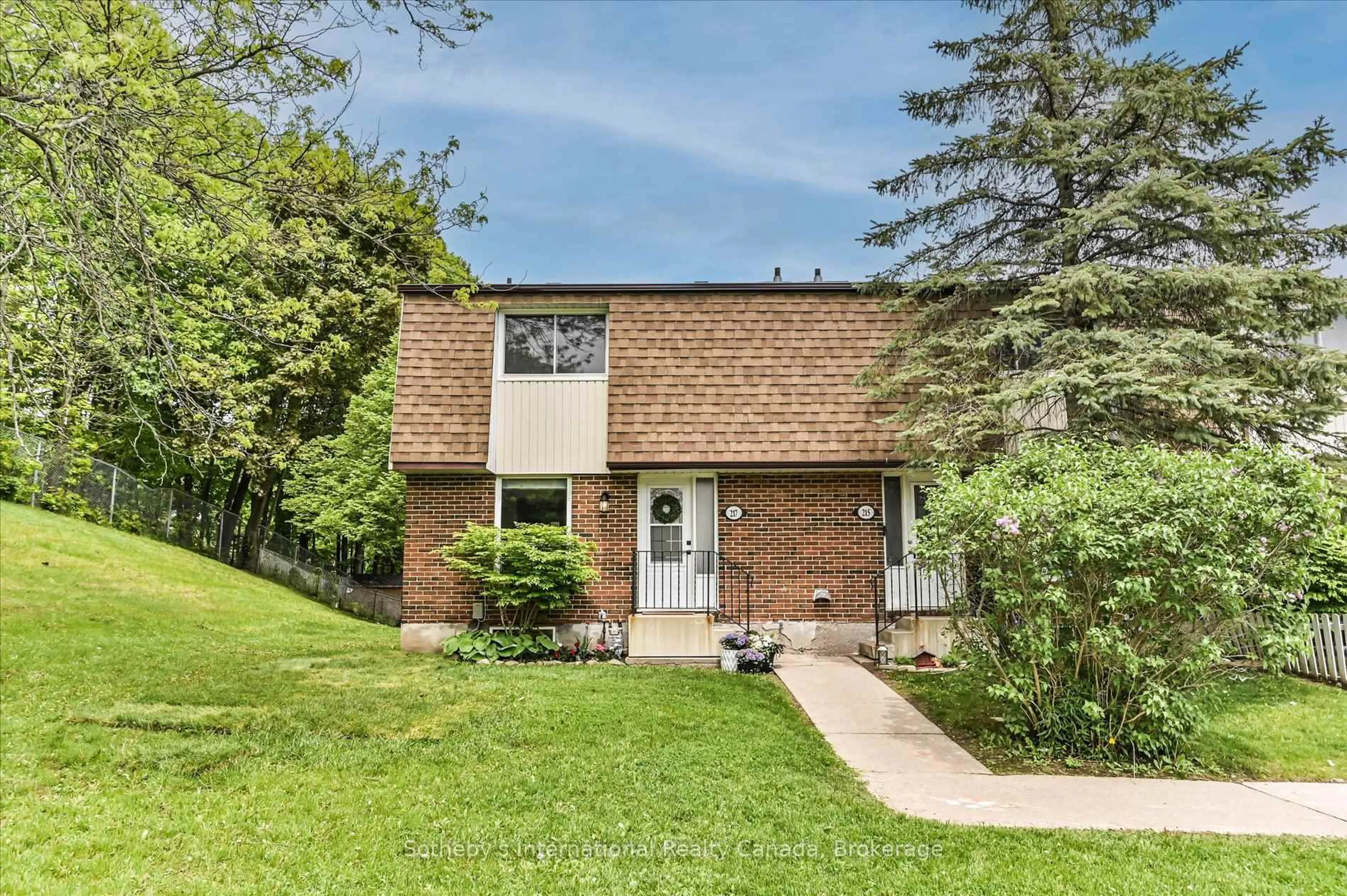 Home with brick exterior material, street for 217 Kingham Rd, Halton Hills Ontario L7J 2T3