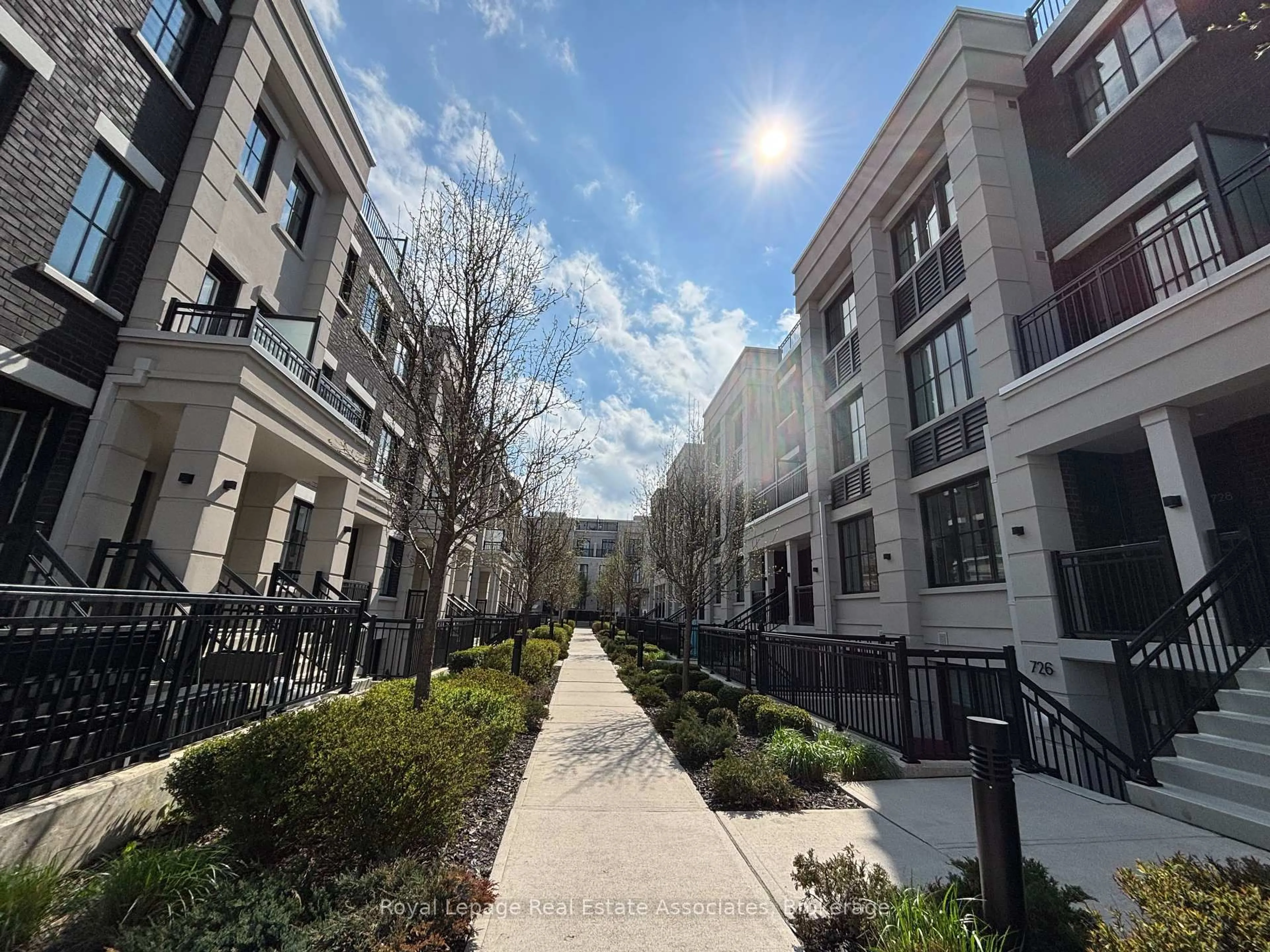 A pic from outside/outdoor area/front of a property/back of a property/a pic from drone, street for 665 Cricklewood Dr #728, Mississauga Ontario L5G 0B9