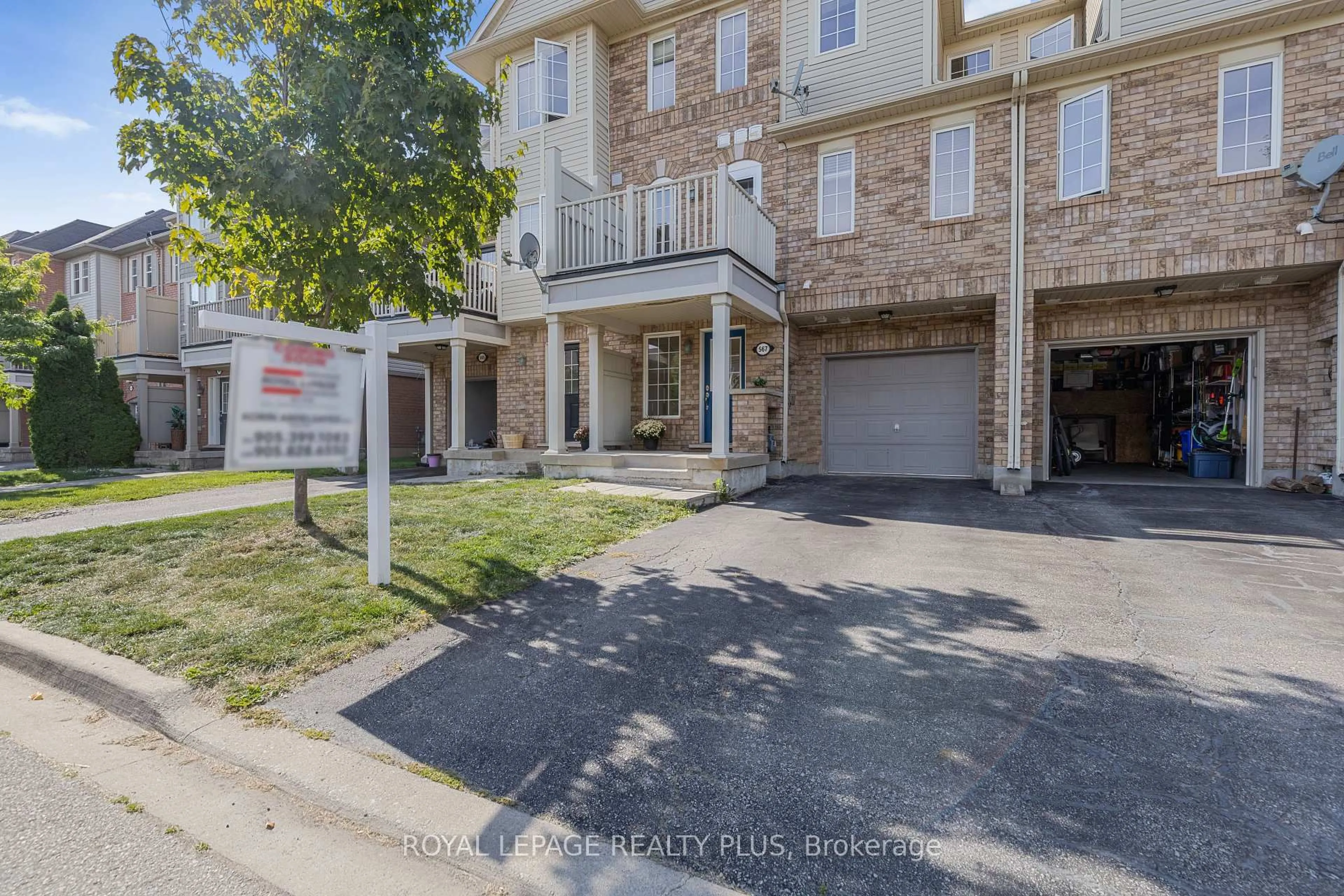 A pic from outside/outdoor area/front of a property/back of a property/a pic from drone, street for 567 Speyer Circ, Milton Ontario L9T 0Y1