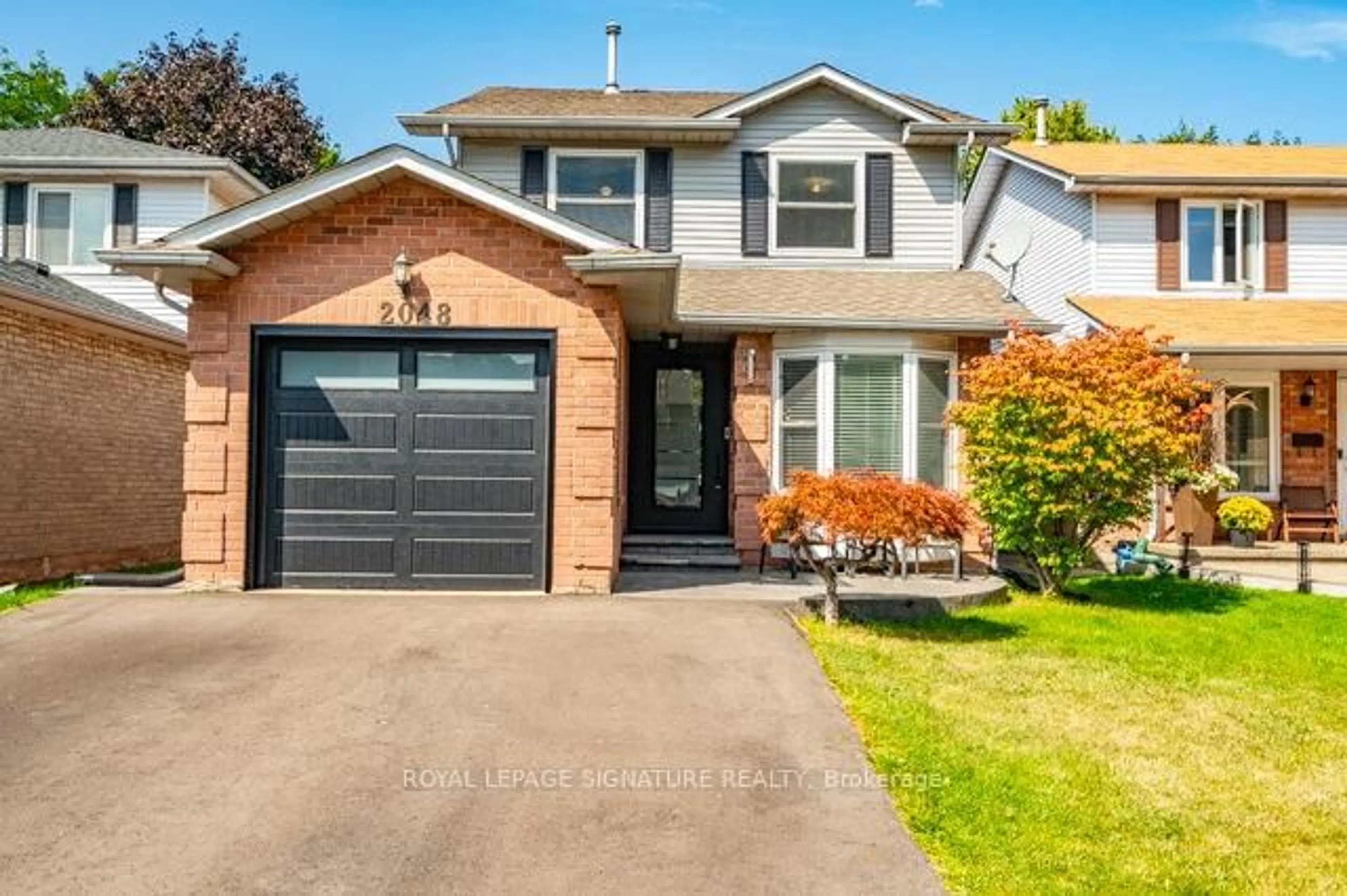 Home with brick exterior material, street for 2048 Chrisdon Rd, Burlington Ontario L7M 3W9