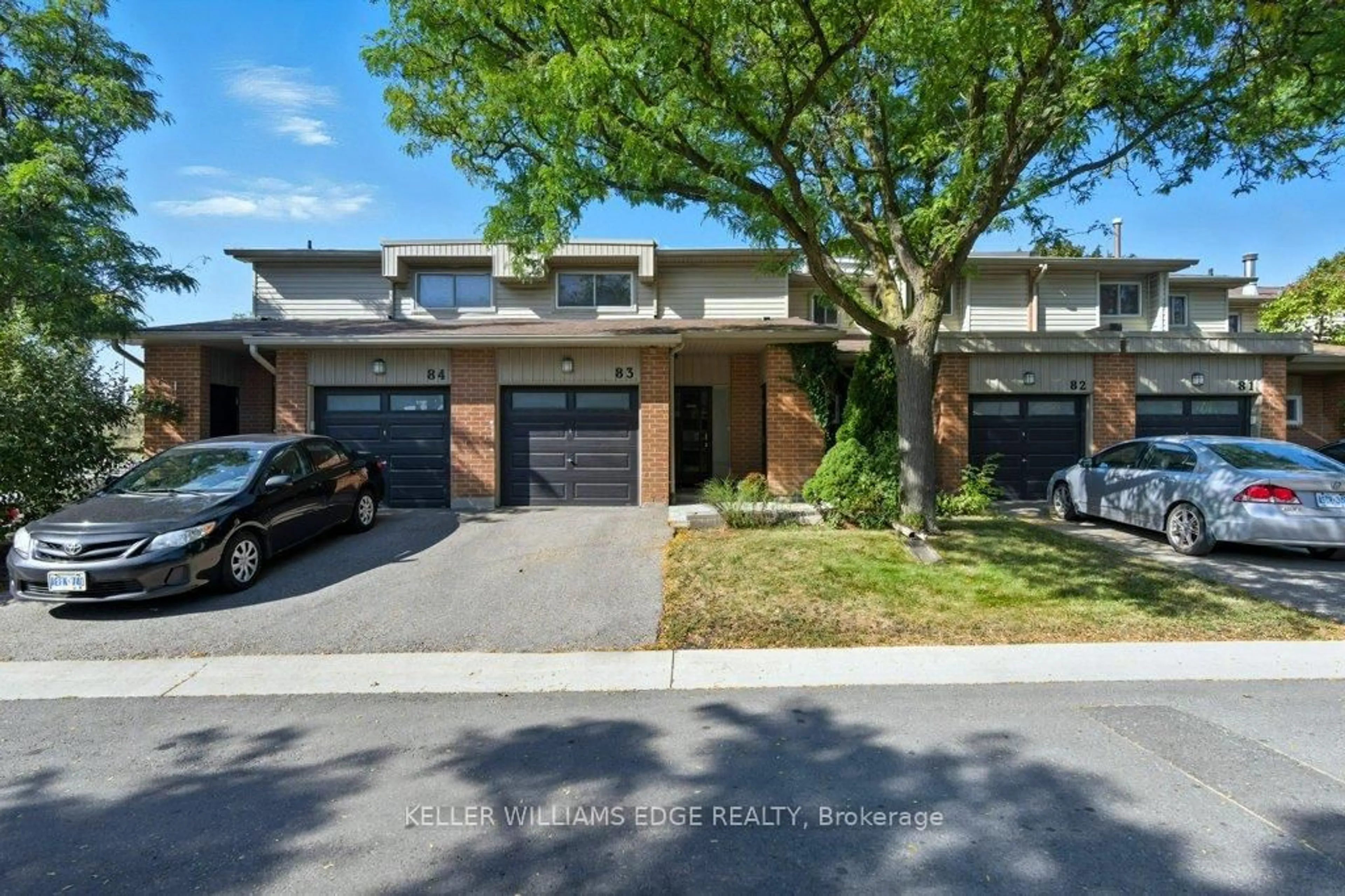 Home with brick exterior material, street for 485 Meadows Blvd #83, Mississauga Ontario L4Z 1H1