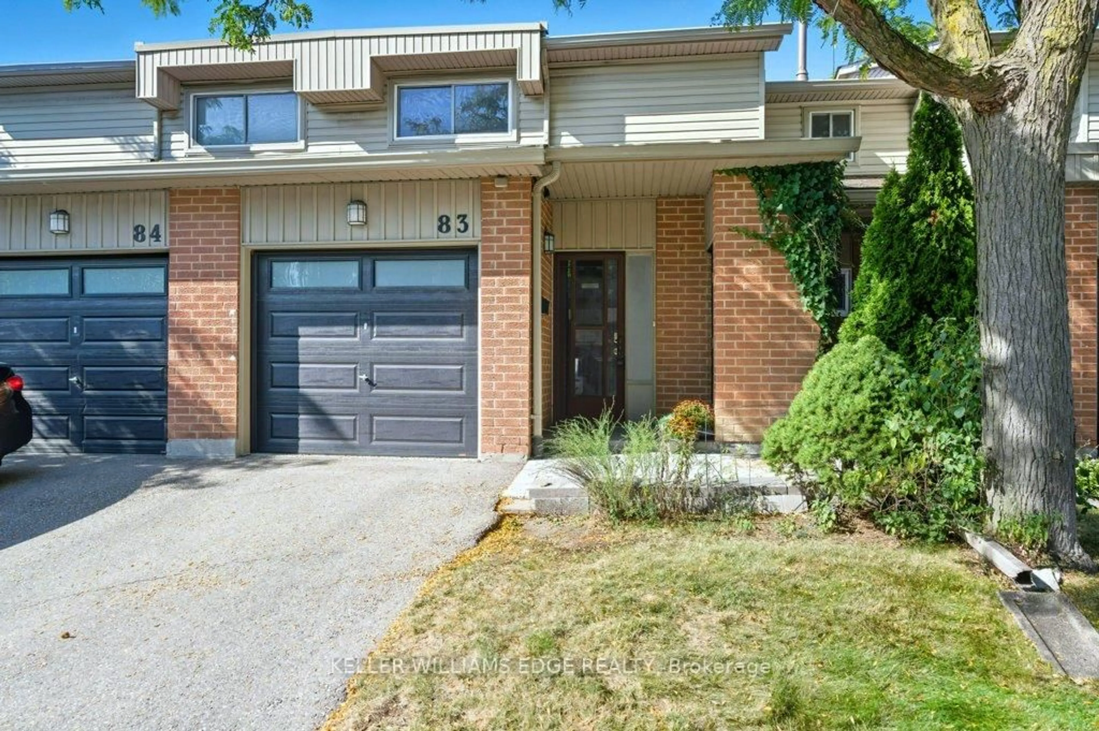 Home with brick exterior material, street for 485 Meadows Blvd #83, Mississauga Ontario L4Z 1H1