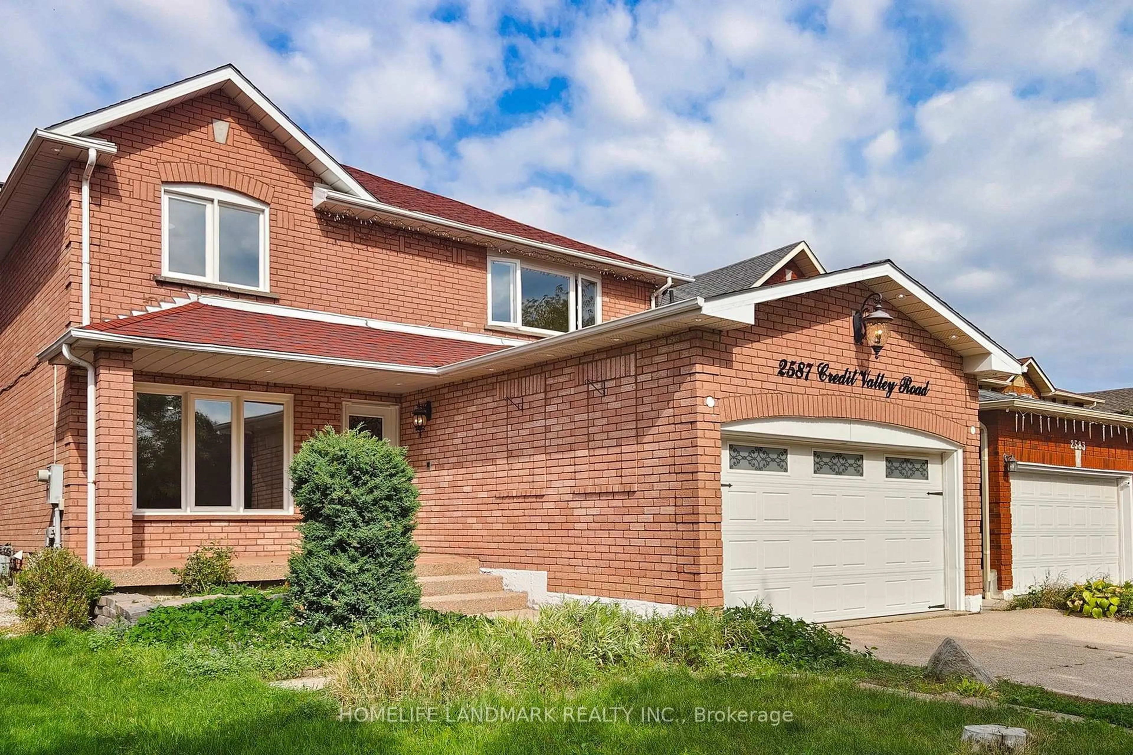 Home with brick exterior material, street for 2587 Credit Valley Rd, Mississauga Ontario L5M 4K7