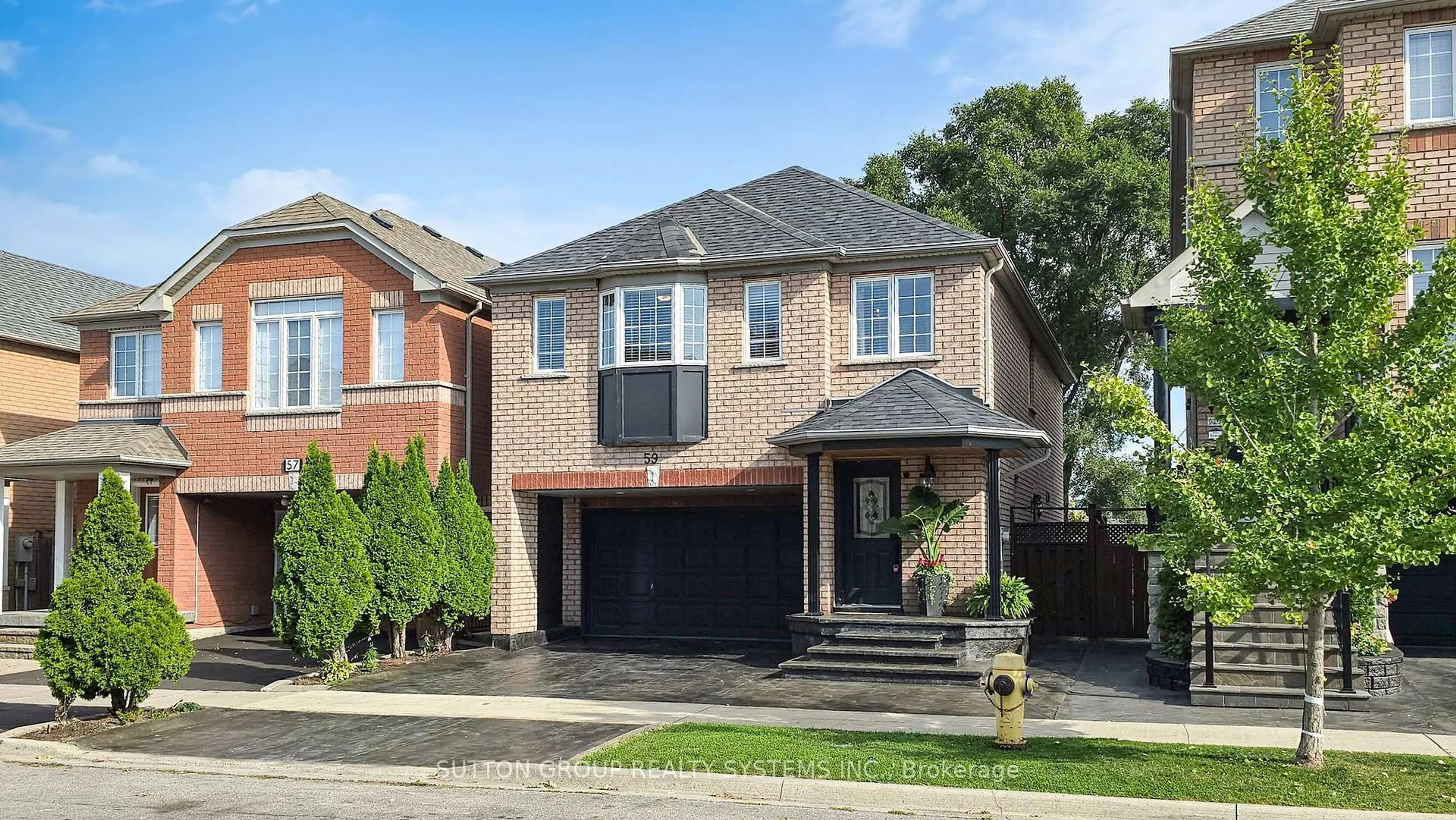 Home with brick exterior material, street for 59 Touchstone Dr, Toronto Ontario M6M 5K8
