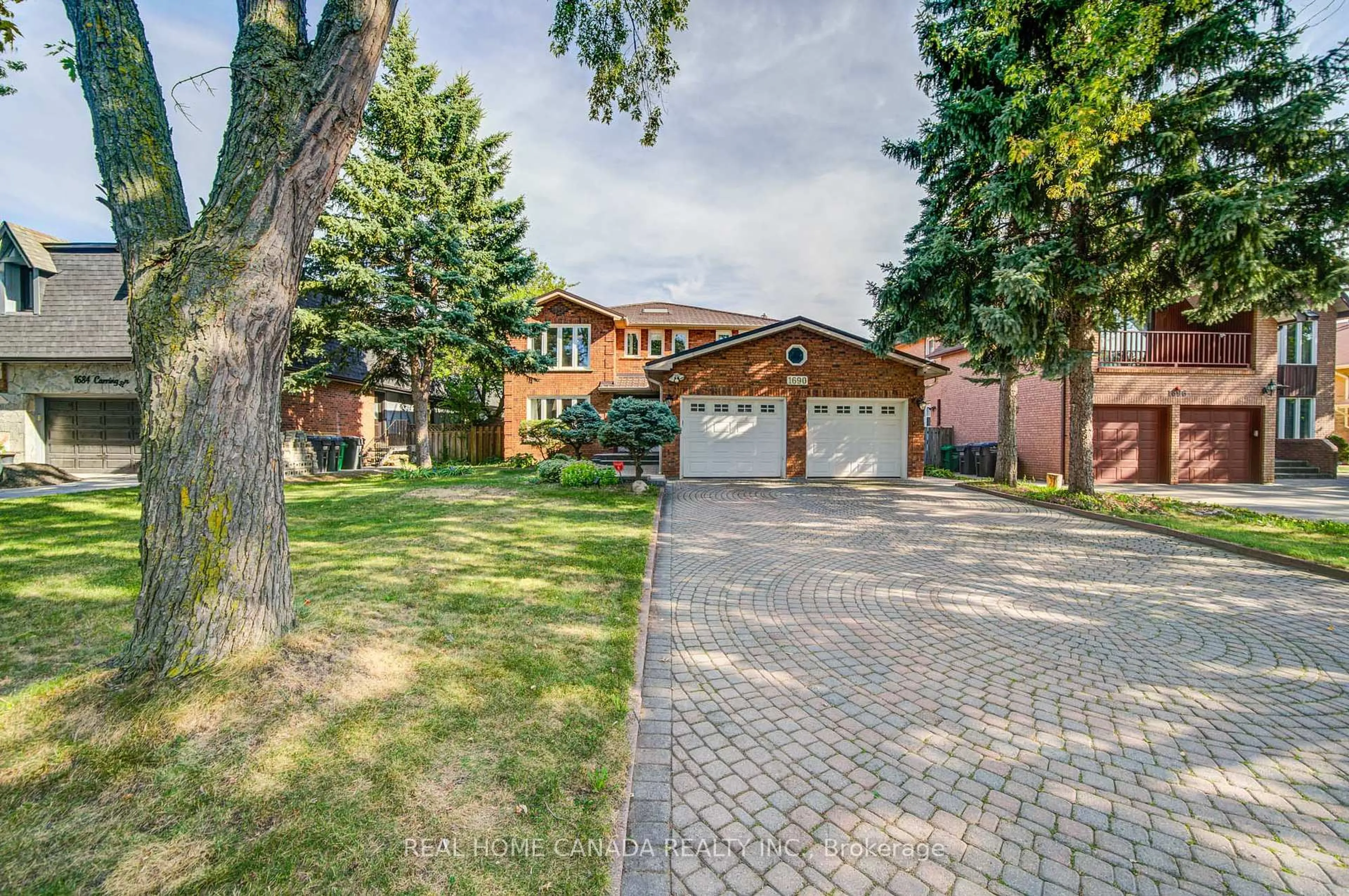 Home with brick exterior material, street for 1690 Carrington Rd, Mississauga Ontario L5M 2K2