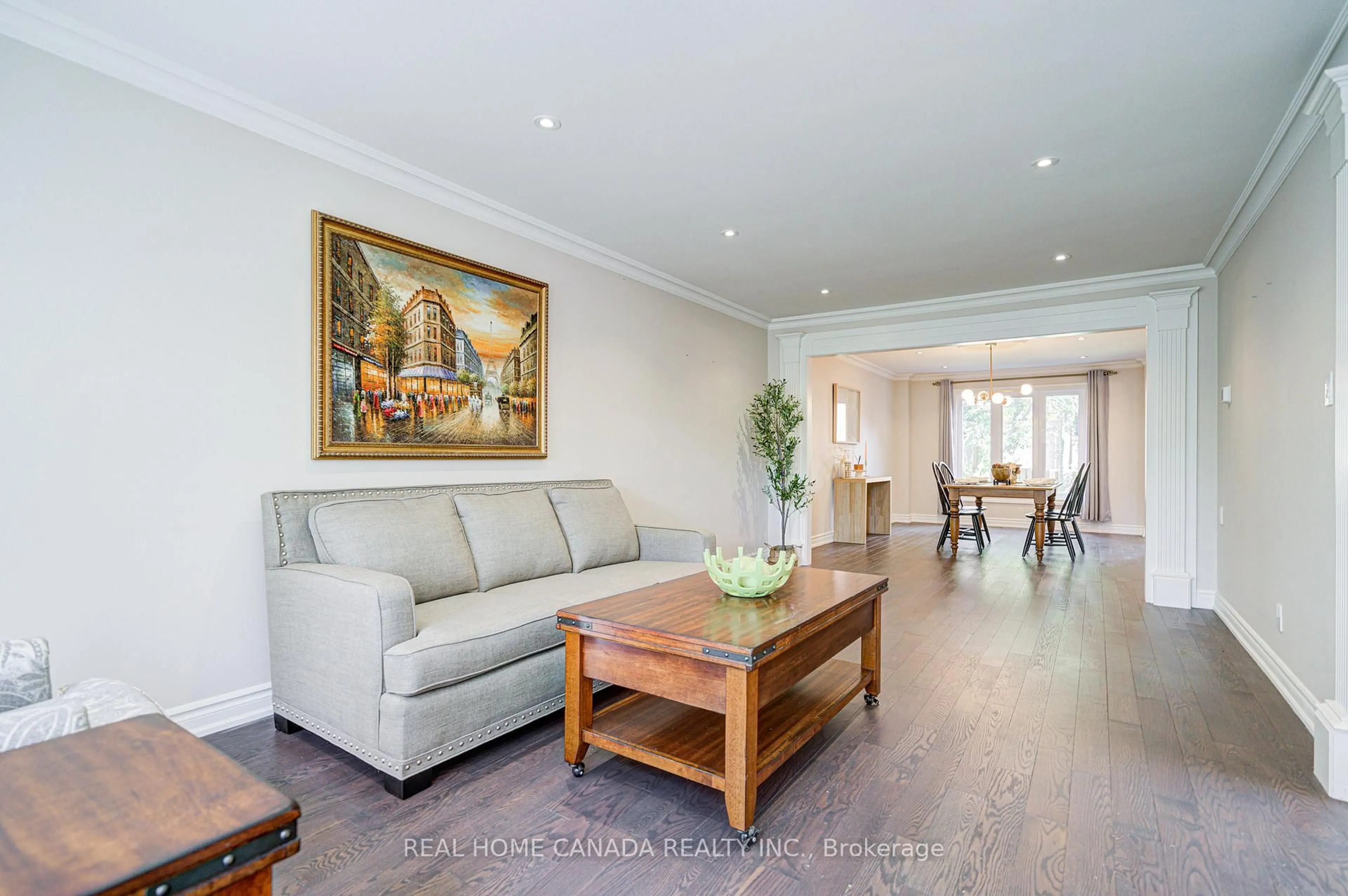 Living room with furniture, wood/laminate floor for 1690 Carrington Rd, Mississauga Ontario L5M 2K2