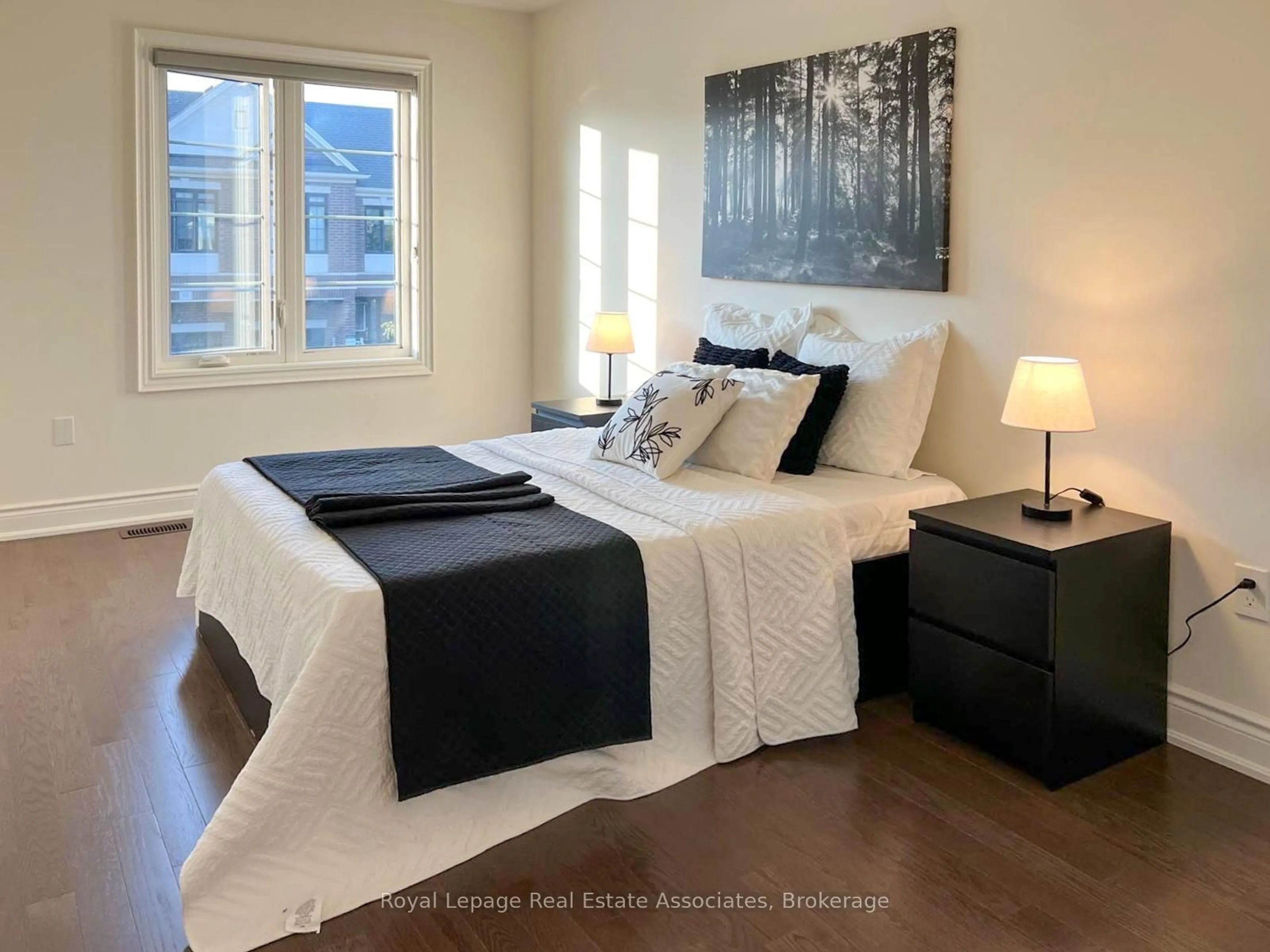 Bedroom with bed, wood/laminate floor for 13 Quinton Rdge, Brampton Ontario L6Y 6J4