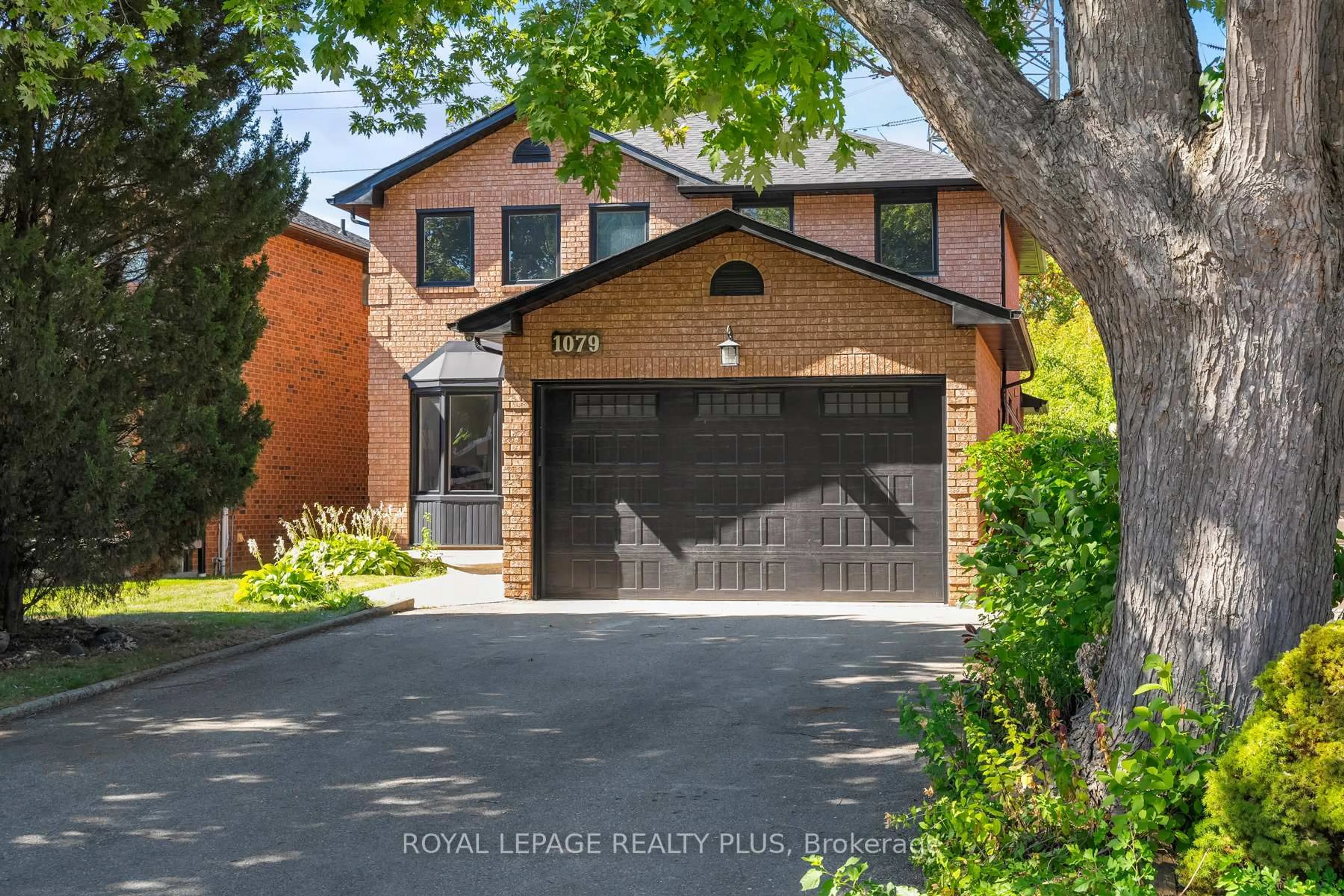 Home with brick exterior material, street for 1079 Hedge Dr, Mississauga Ontario L4Y 1G3