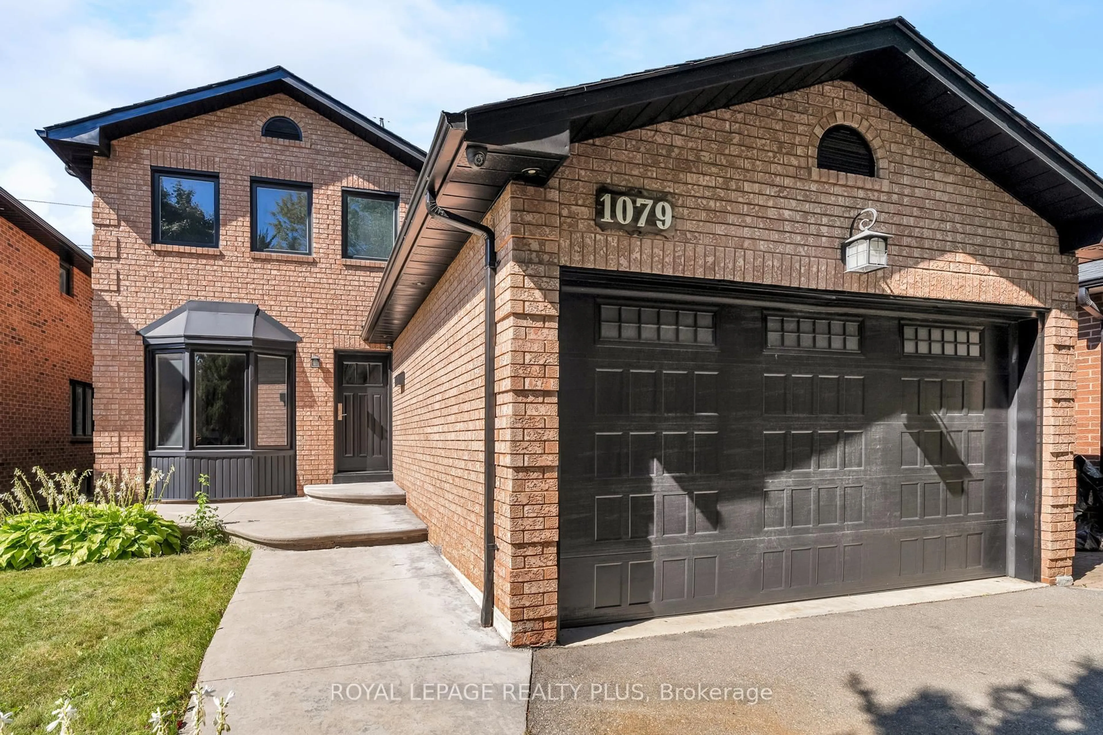 Home with brick exterior material, street for 1079 Hedge Dr, Mississauga Ontario L4Y 1G3