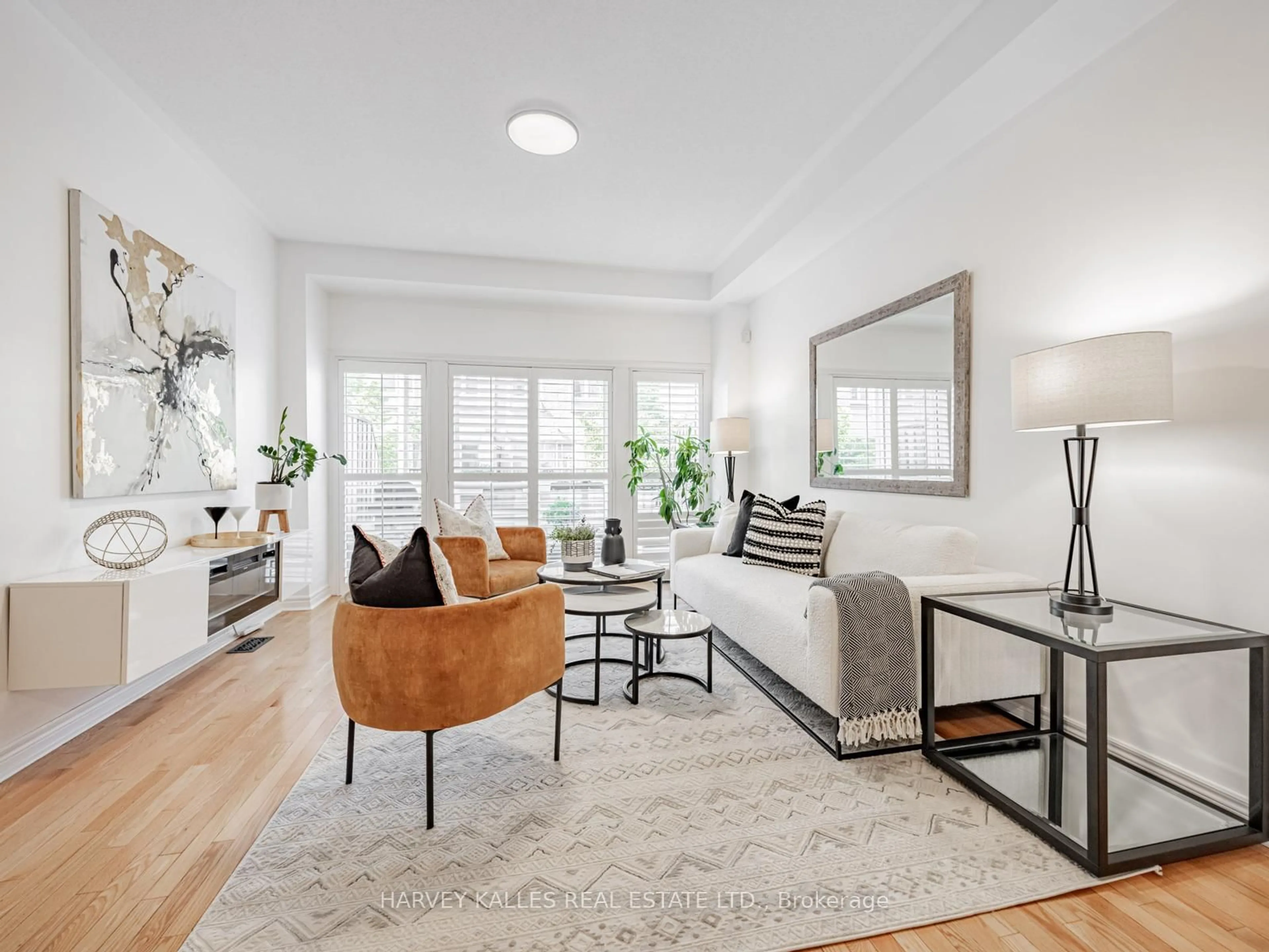 Living room with furniture, unknown for 52 Market Garden Mews, Toronto Ontario M8Z 0A5