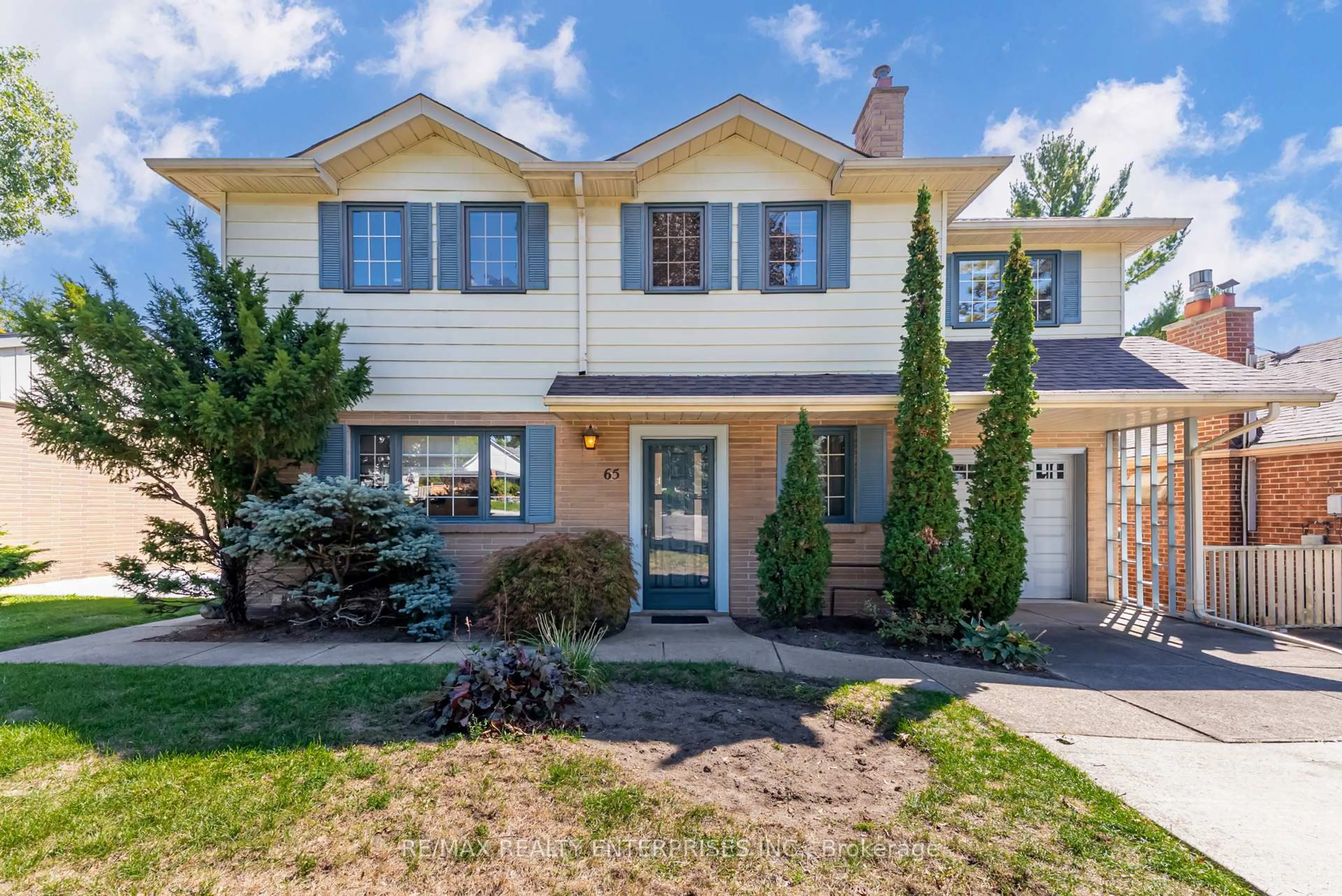 Home with vinyl exterior material, street for 65 Black Creek Blvd, Toronto Ontario M6N 2K6
