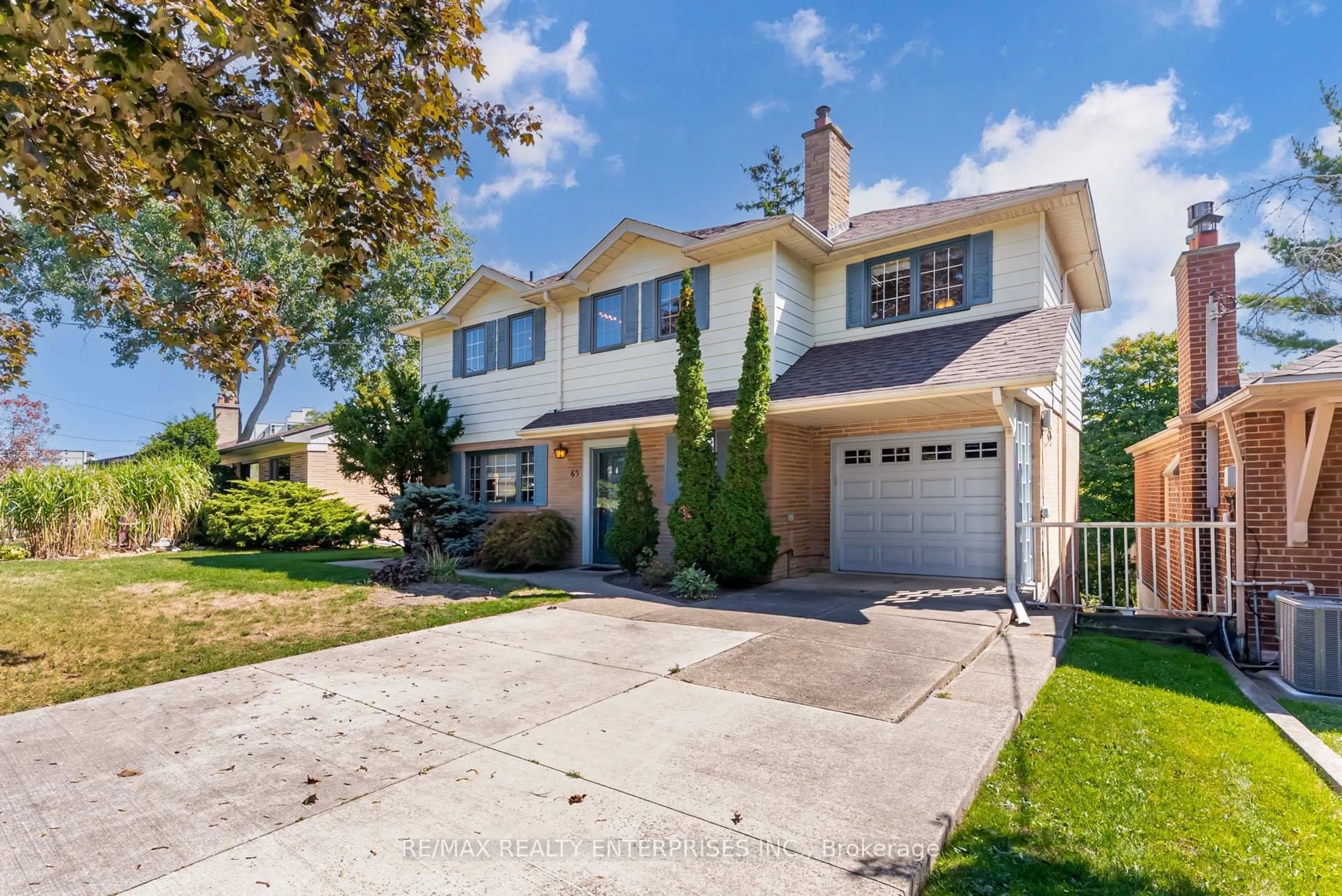 Home with vinyl exterior material, street for 65 Black Creek Blvd, Toronto Ontario M6N 2K6