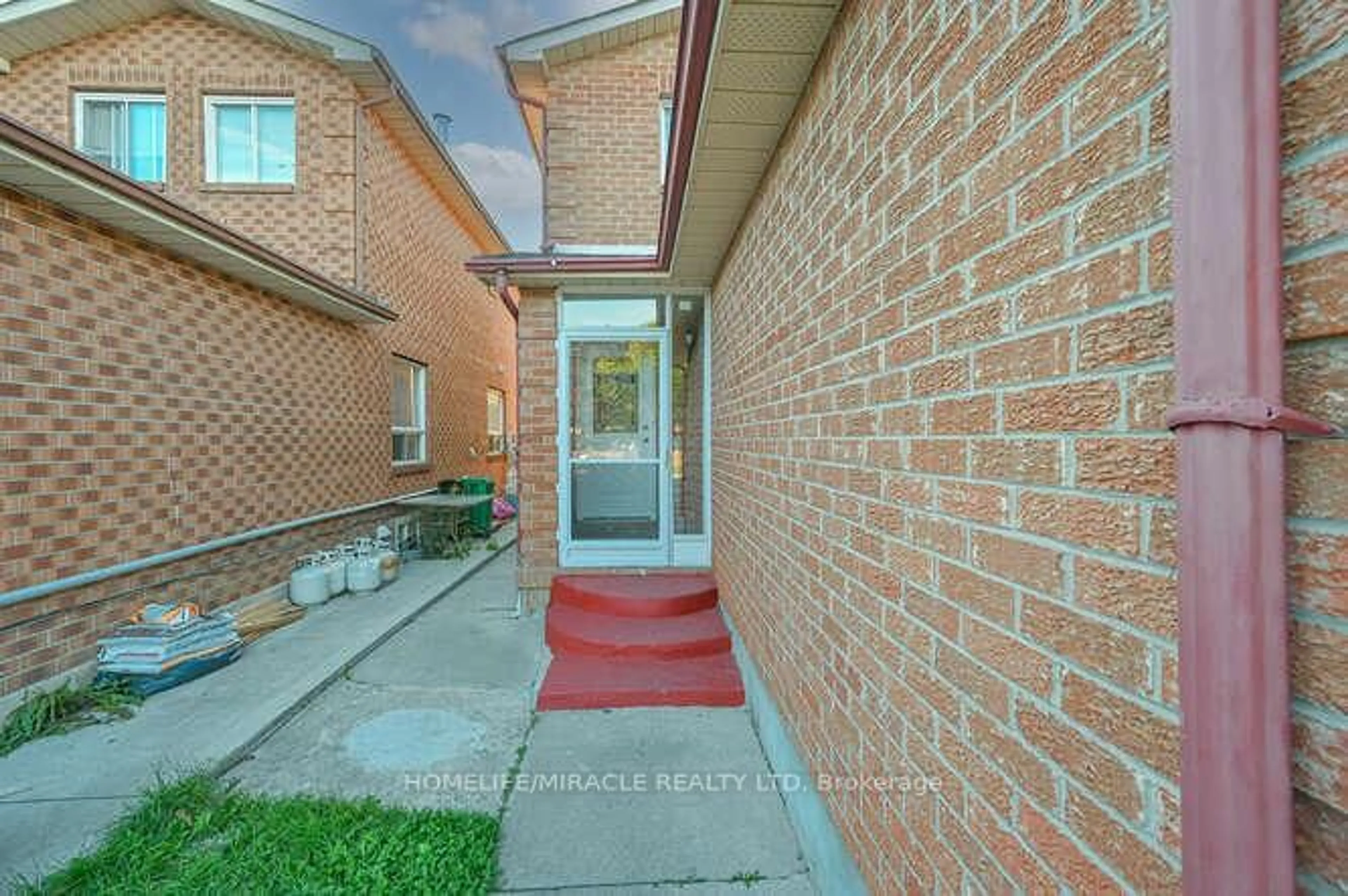 Home with brick exterior material, street for 66 Metzak Dr, Brampton Ontario L6Z 4N4