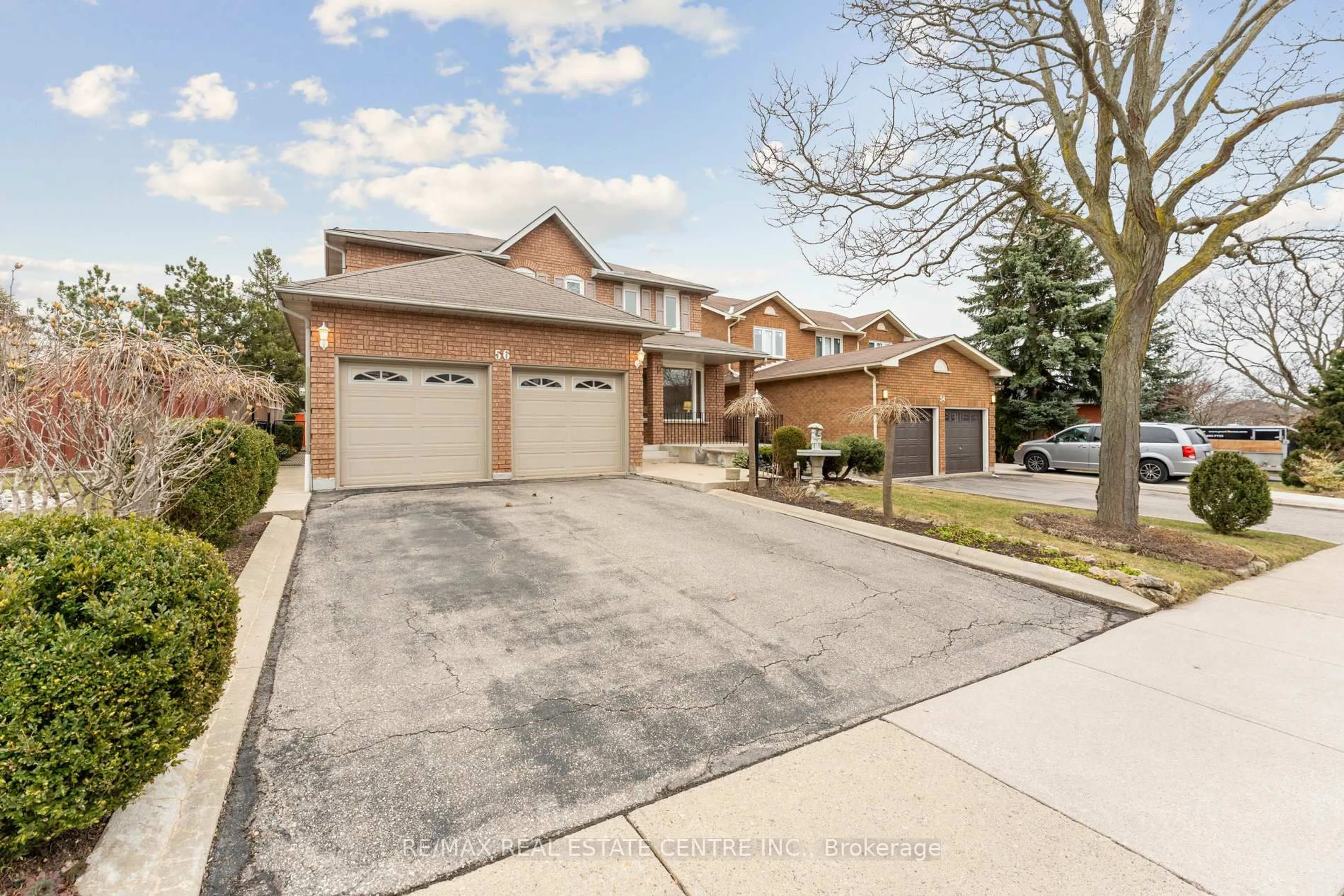 Home with brick exterior material, street for 56 Canarvan Crt, Brampton Ontario L6Y 4N1
