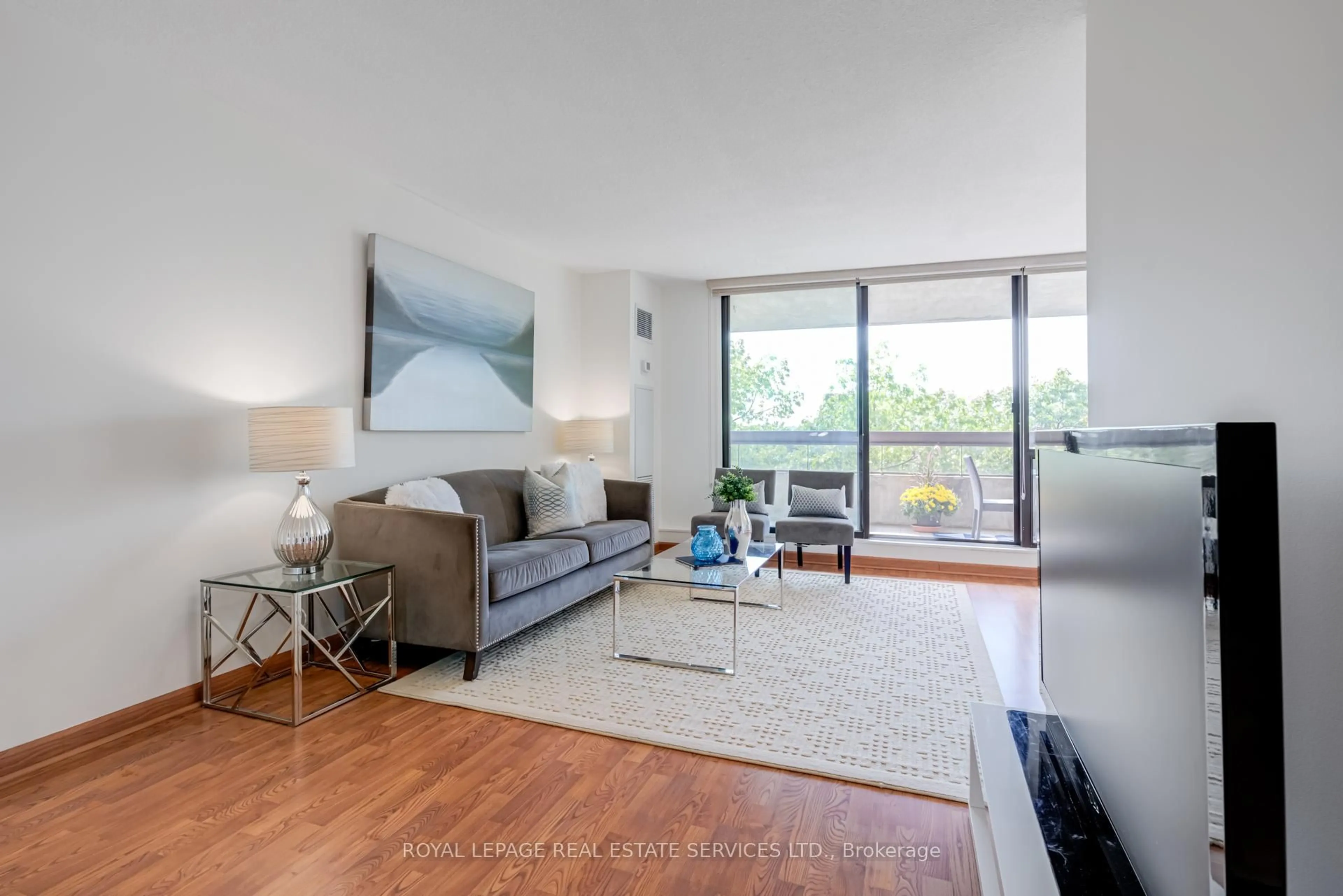 Living room with furniture, unknown for 80 Quebec Ave #704, Toronto Ontario M6P 4B7