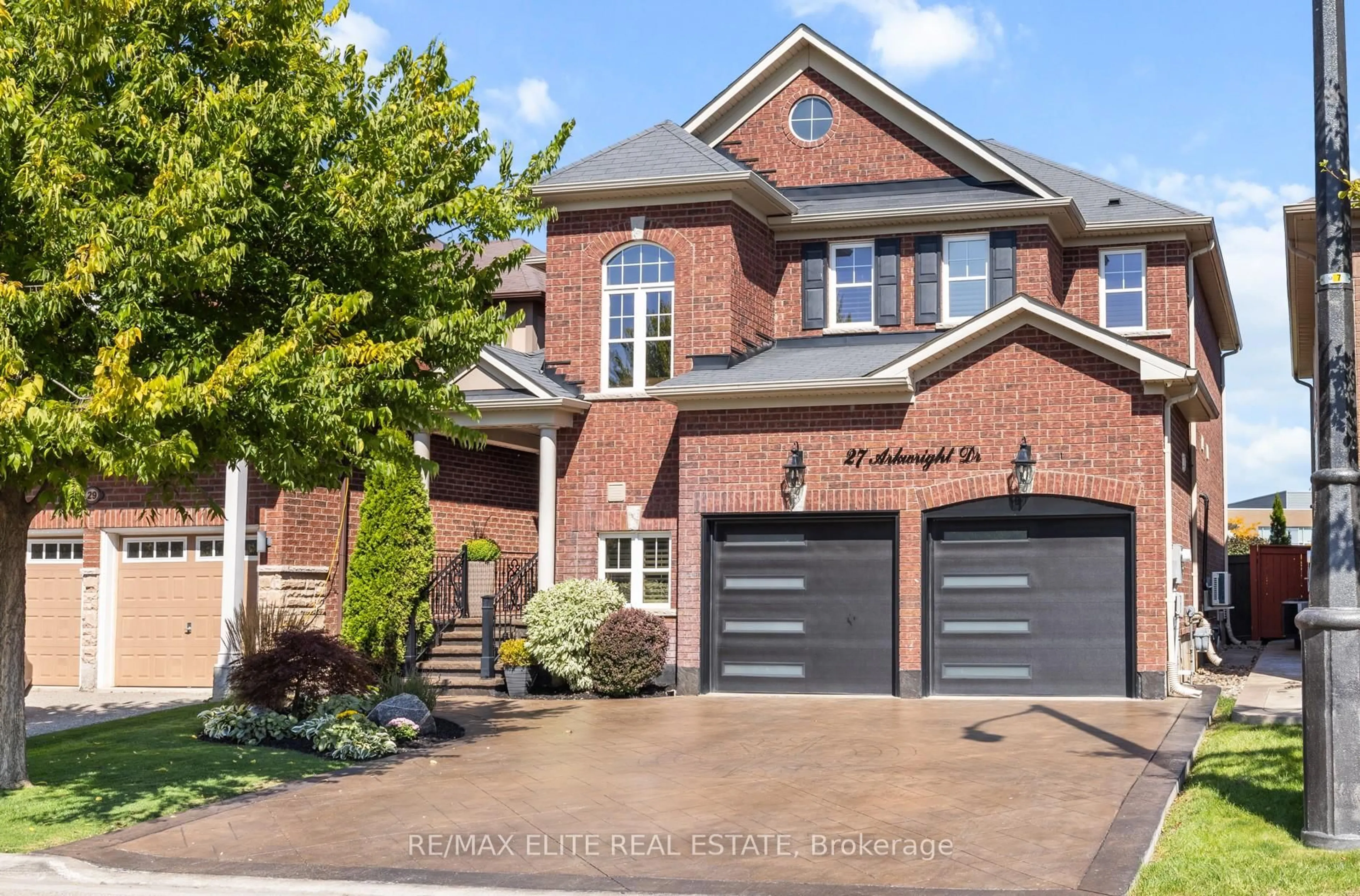 Home with brick exterior material, street for 27 Arkwright Dr, Brampton Ontario L7A 0V2