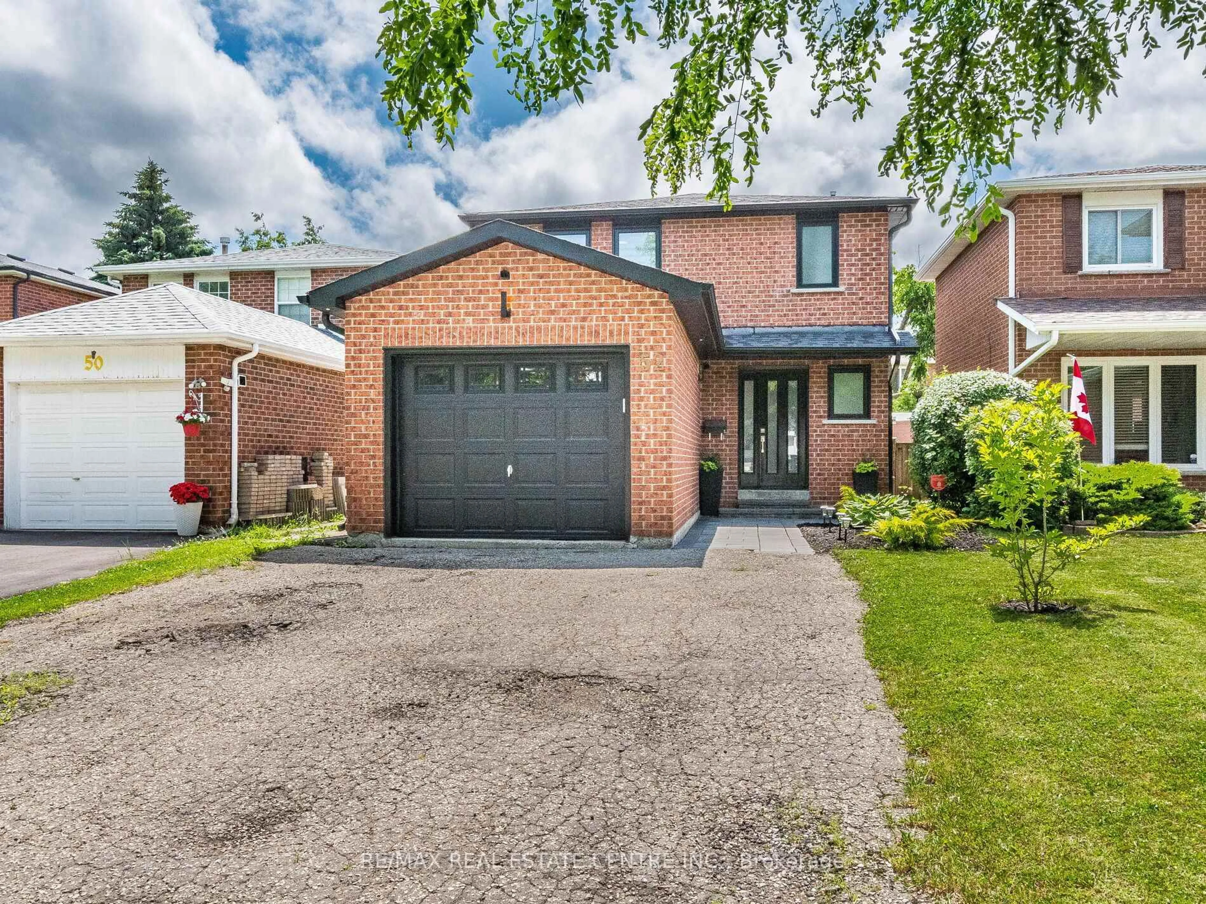 Home with brick exterior material, street for 52 MOZART Cres, Brampton Ontario L6Y 2W7