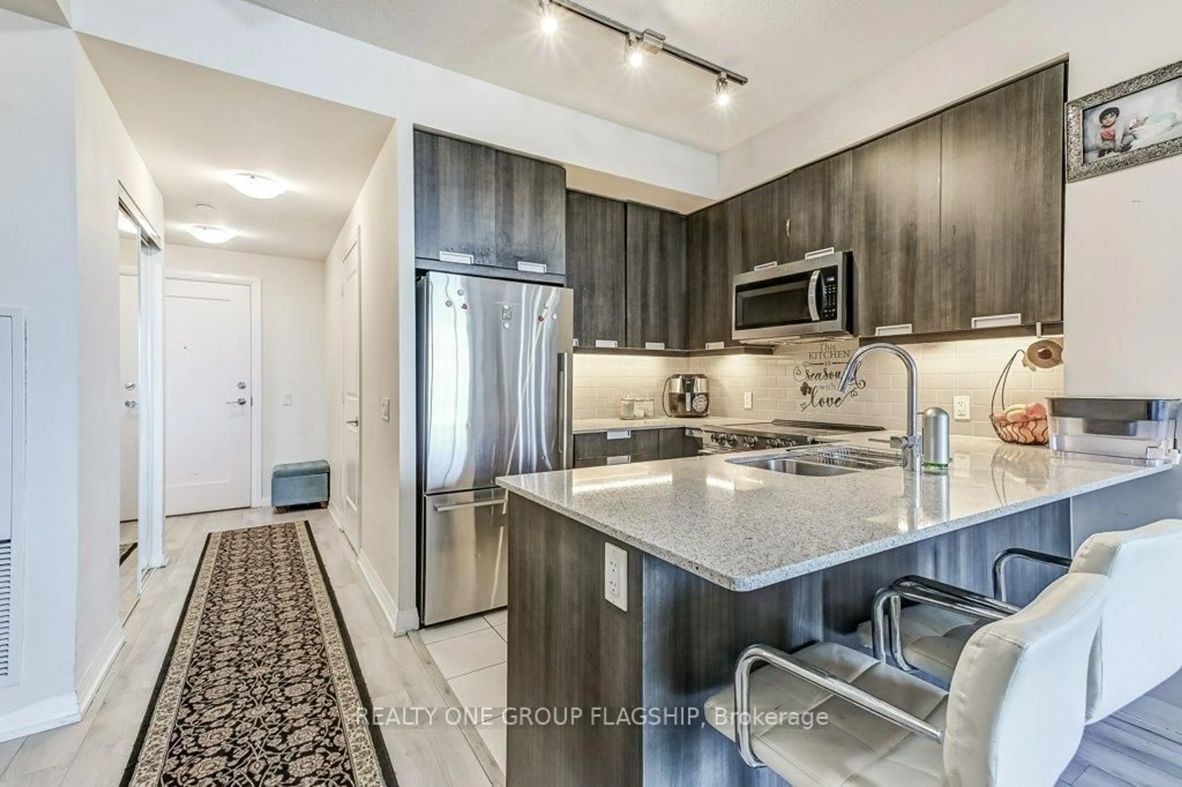 Open concept kitchen, unknown for 35 Watergarden Dr #413, Mississauga Ontario L5R 0G8