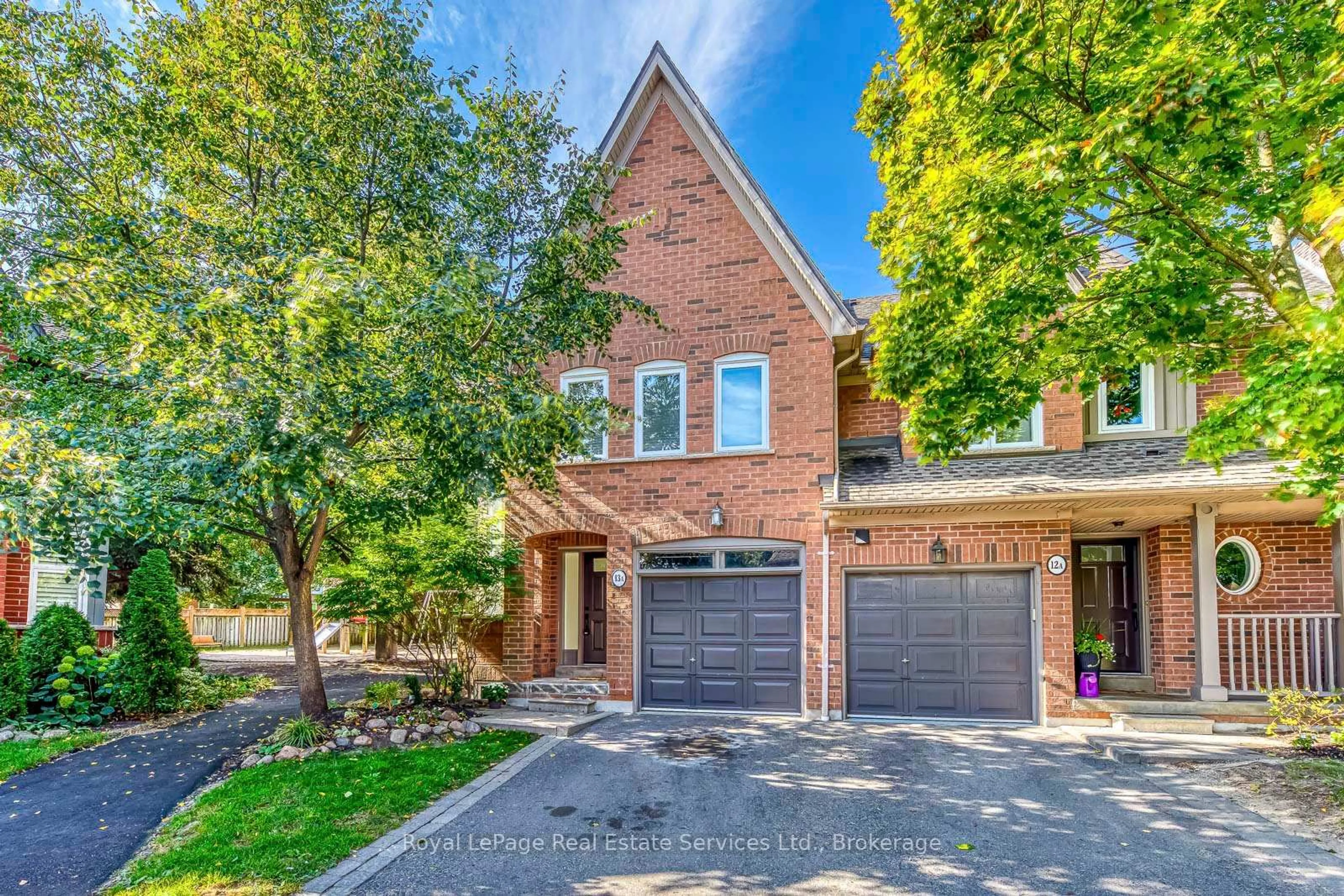 Home with brick exterior material, street for 1064 Queen St #13A, Mississauga Ontario L5H 4K3