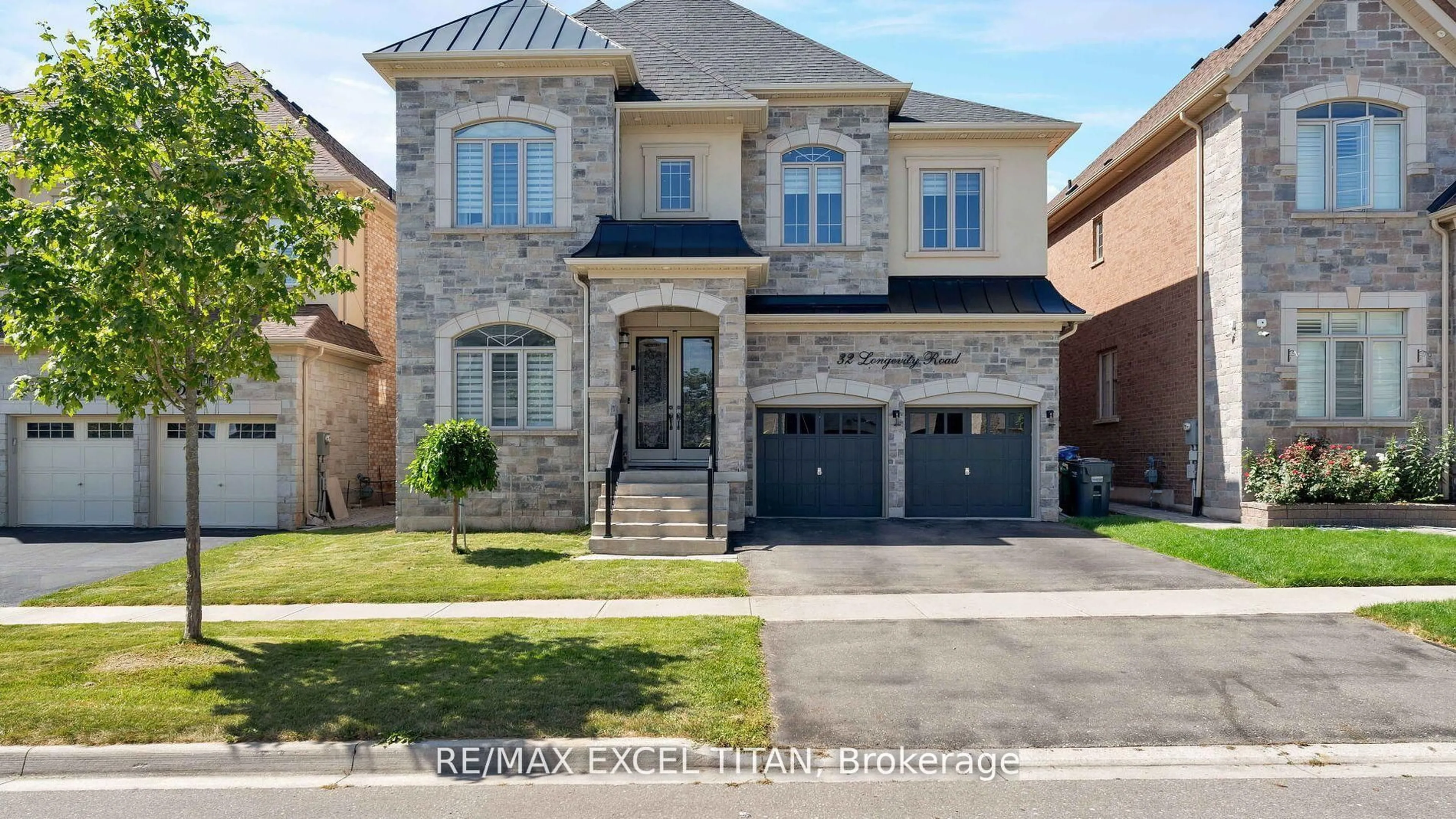 Home with brick exterior material, street for 32 Longevity Rd, Brampton Ontario L6X 5P3