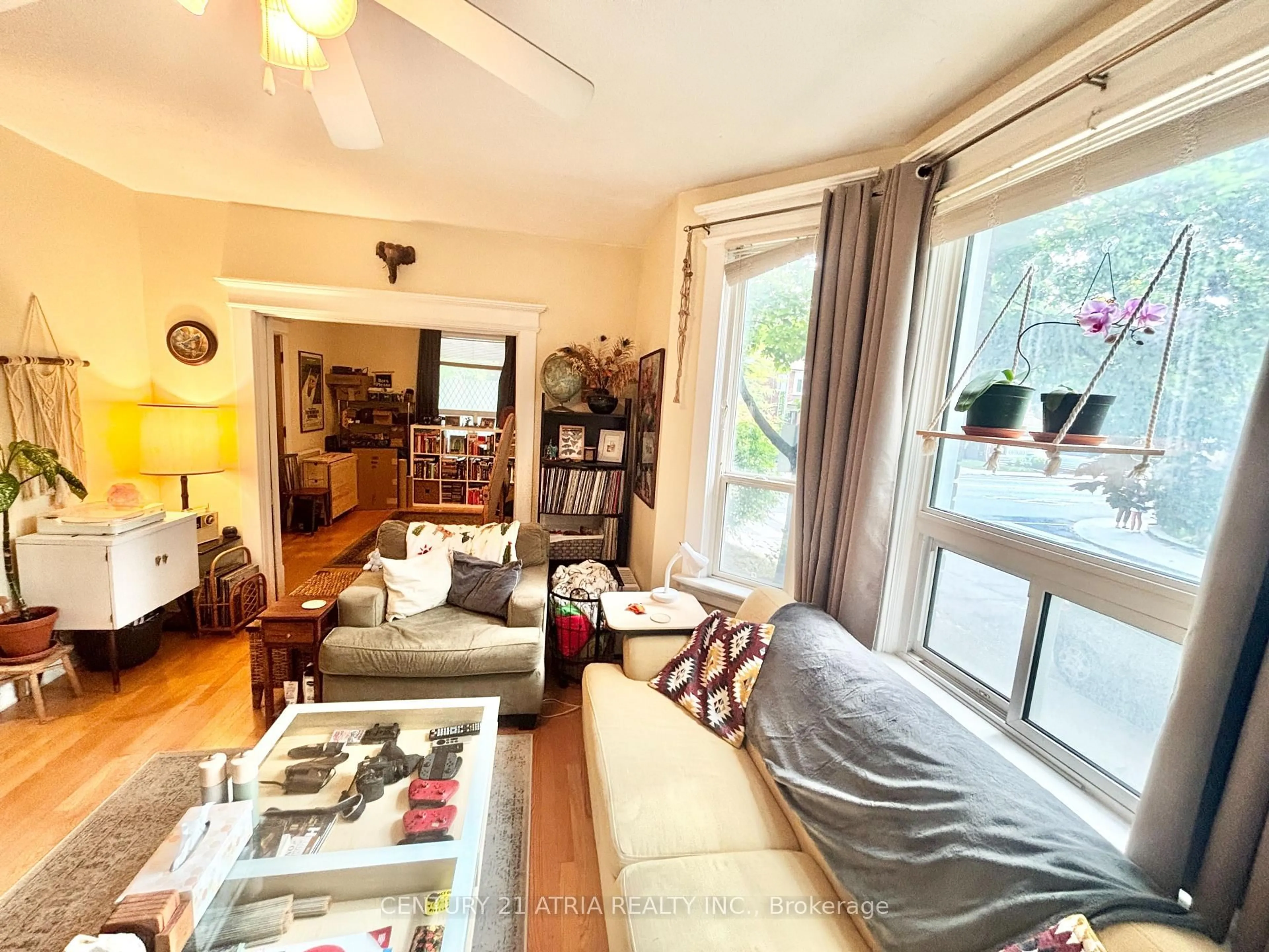 Living room with furniture, unknown for 442 Runnymede Rd, Toronto Ontario M6S 2Z1