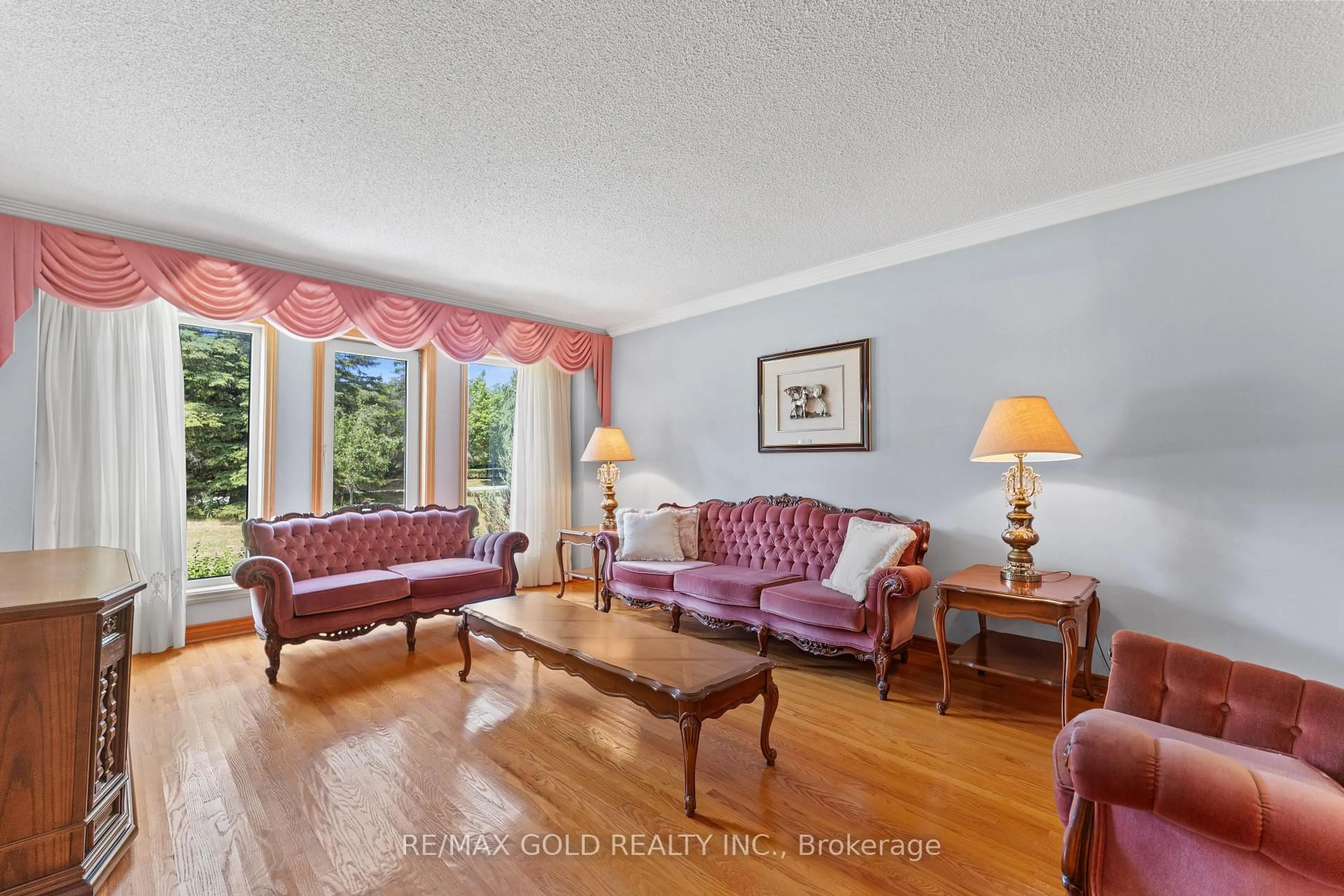 Living room with furniture, unknown for 8 Ryckman Lane, Brampton Ontario L6P 0C7