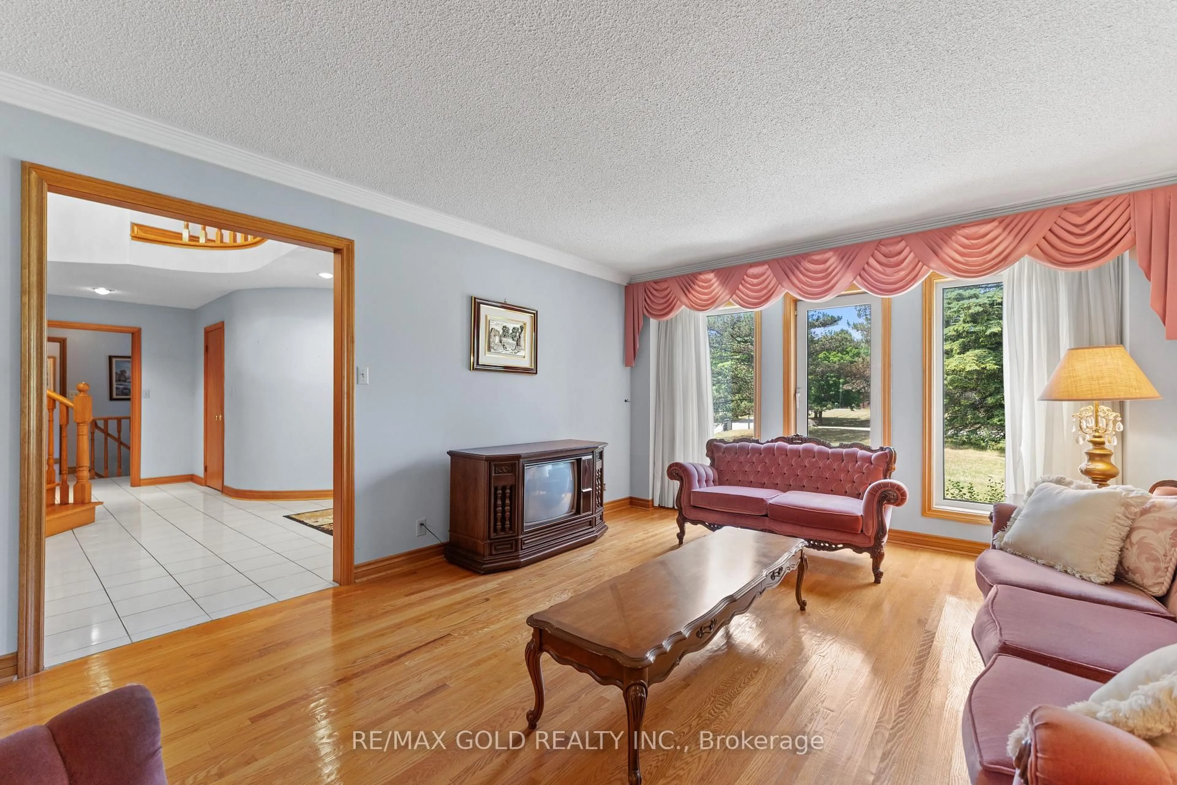 Living room with furniture, unknown for 8 Ryckman Lane, Brampton Ontario L6P 0C7