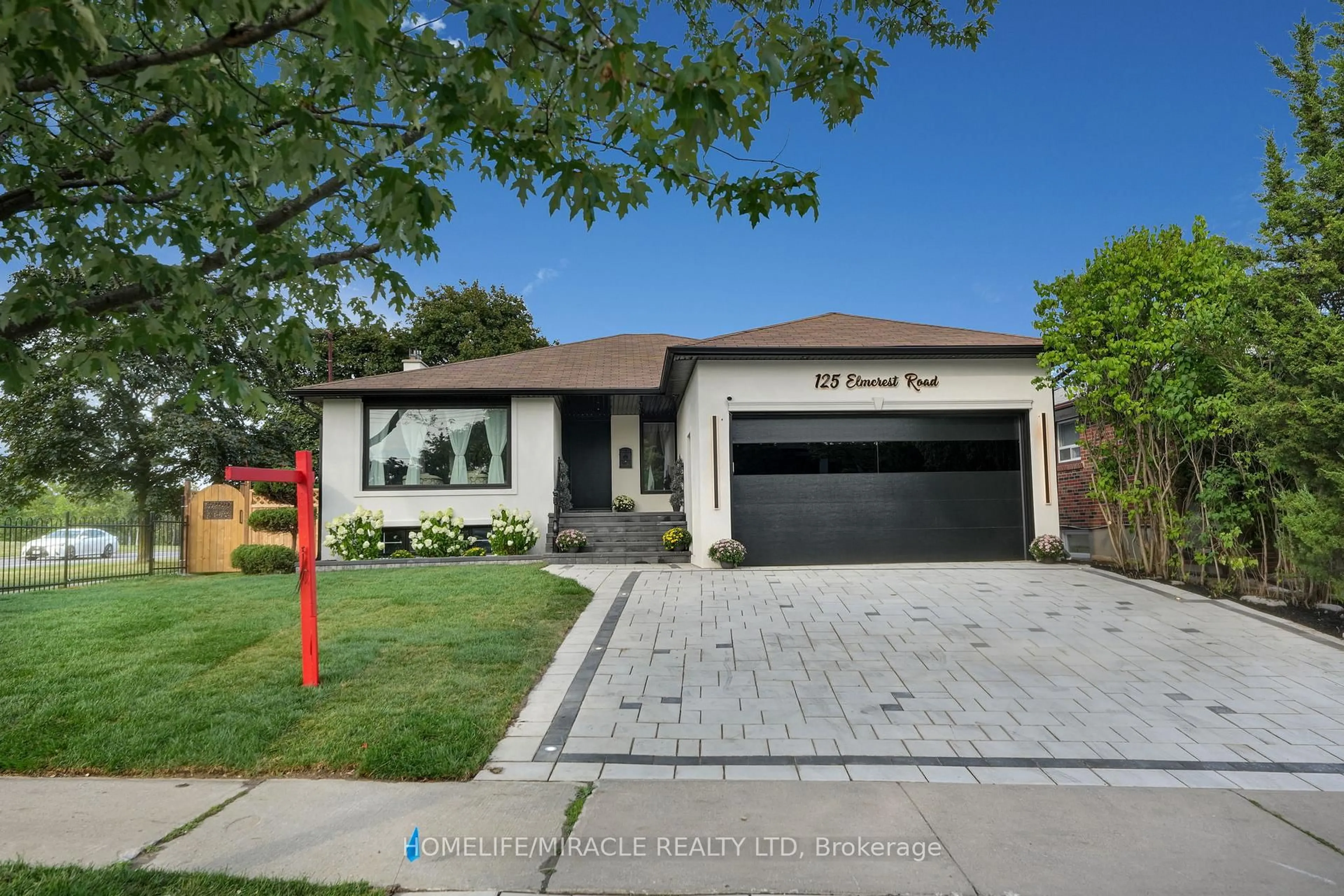 Home with brick exterior material, street for 125 Elmcrest Rd, Toronto Ontario M9C 3R5