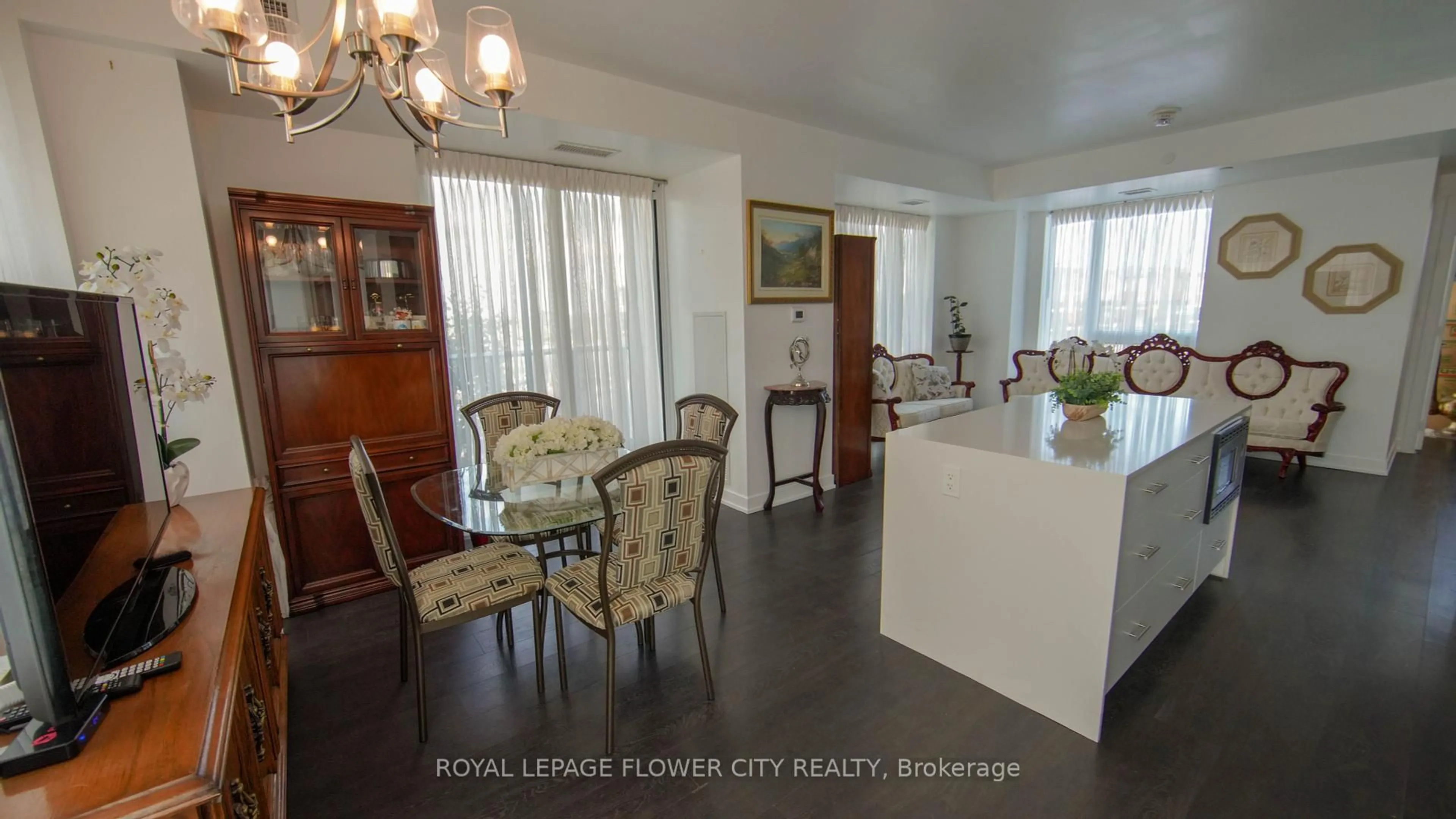 Dining room, wood/laminate floor for 180 Veterans Dr #203, Brampton Ontario L7A 5G7