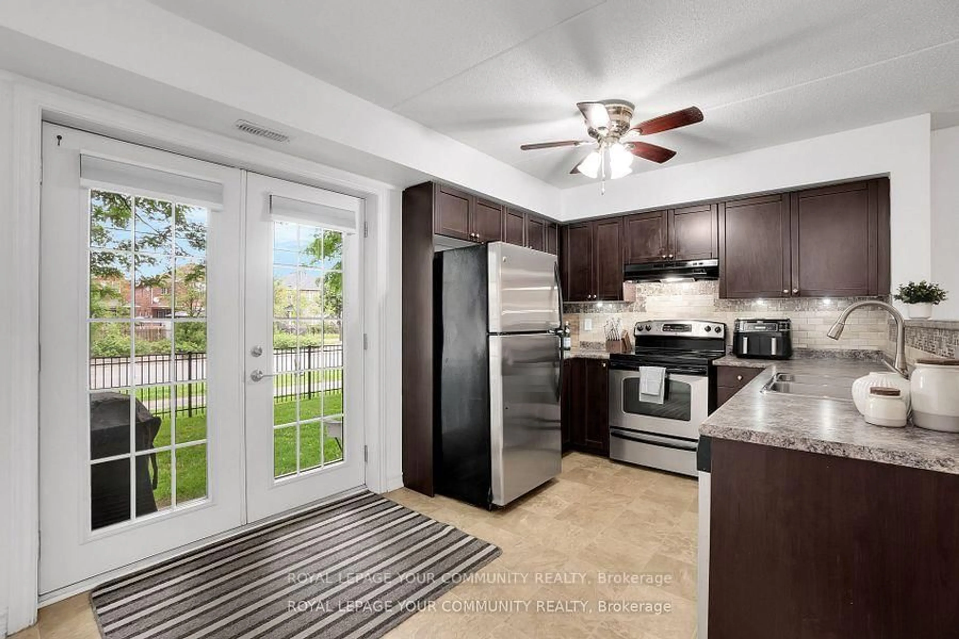 Open concept kitchen, ceramic/tile floor for 1360 Main St #101, Milton Ontario L9T 7S5