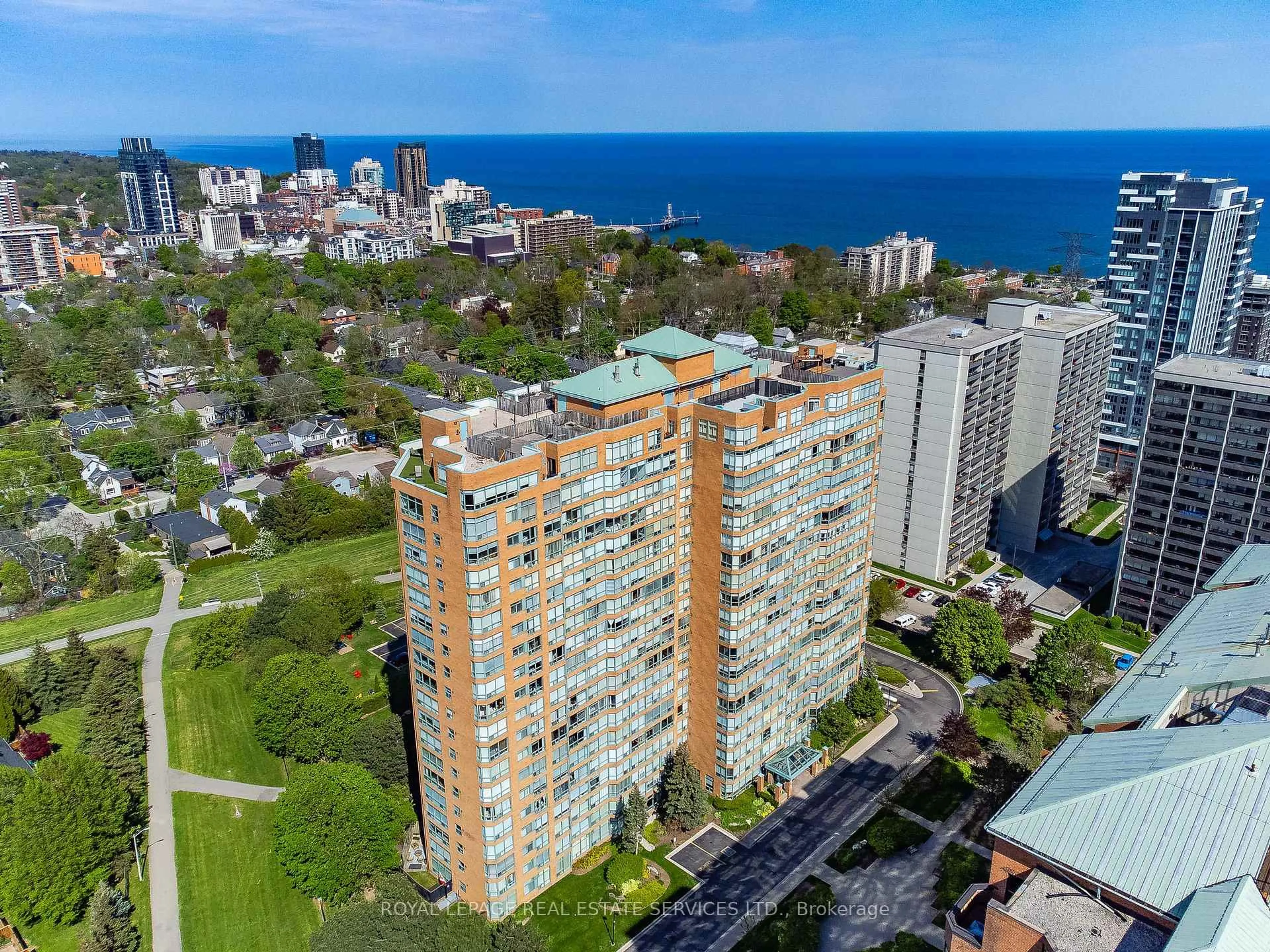 A pic from outside/outdoor area/front of a property/back of a property/a pic from drone, city buildings view from balcony for 1276 Maple Crossing Blvd #614, Burlington Ontario L7S 2J9