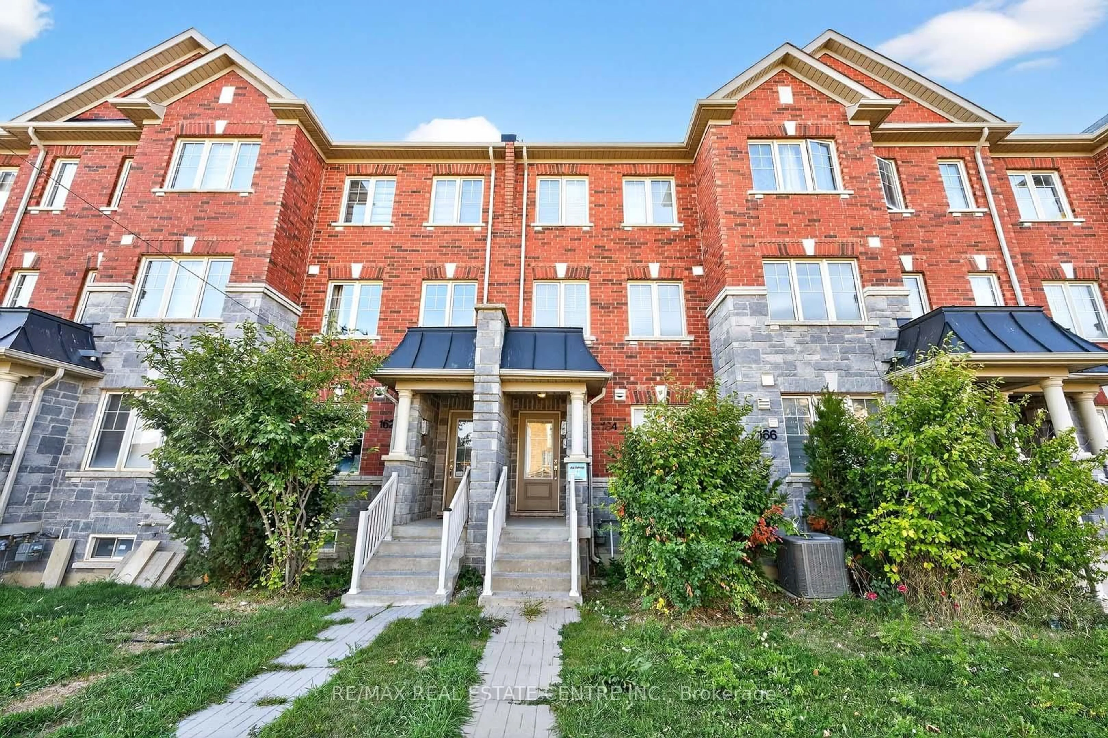 Home with brick exterior material, street for 164 Inspire Blvd, Brampton Ontario L6R 3X7