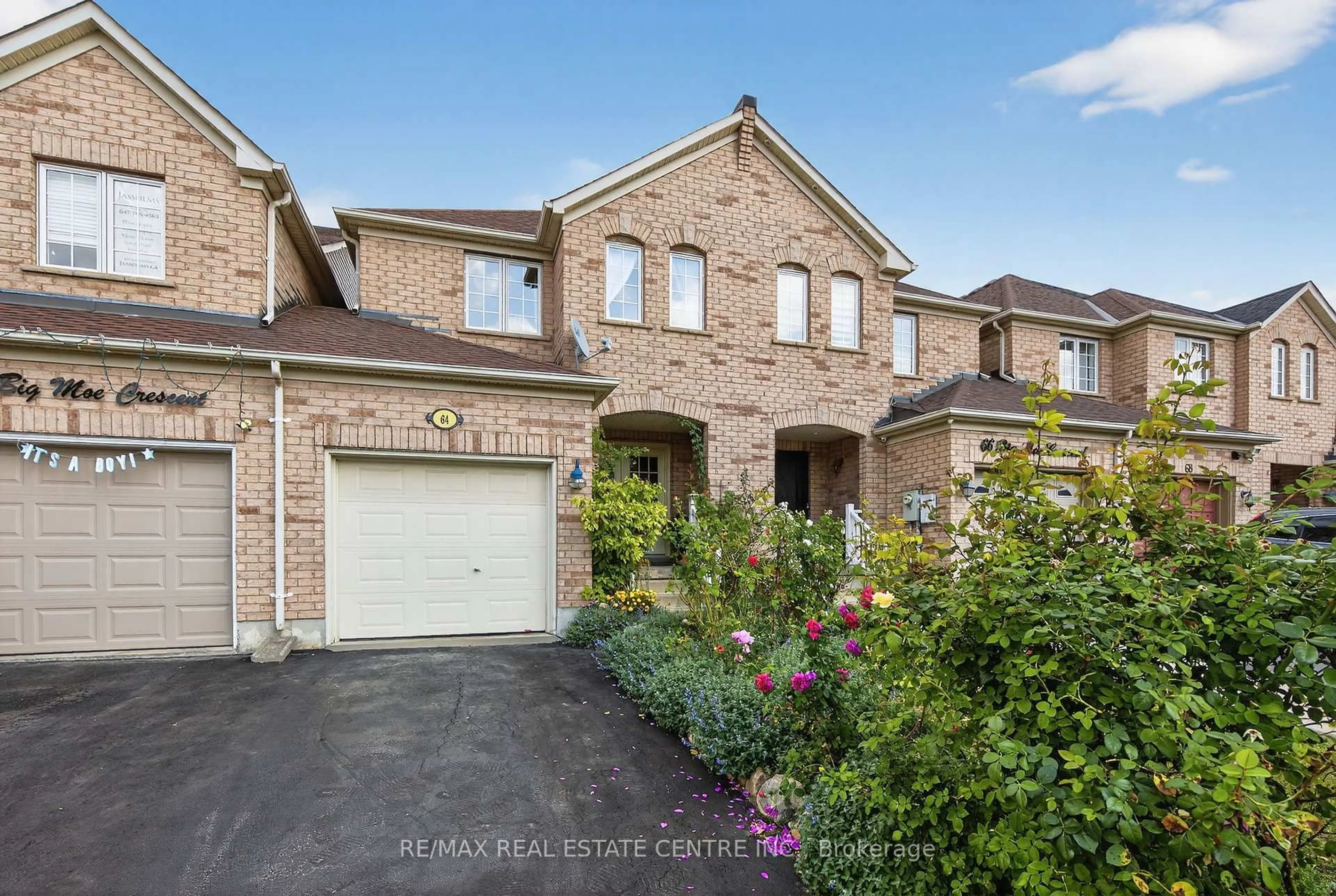 Home with brick exterior material, street for 64 Big Moe Cres, Brampton Ontario L6P 1J8