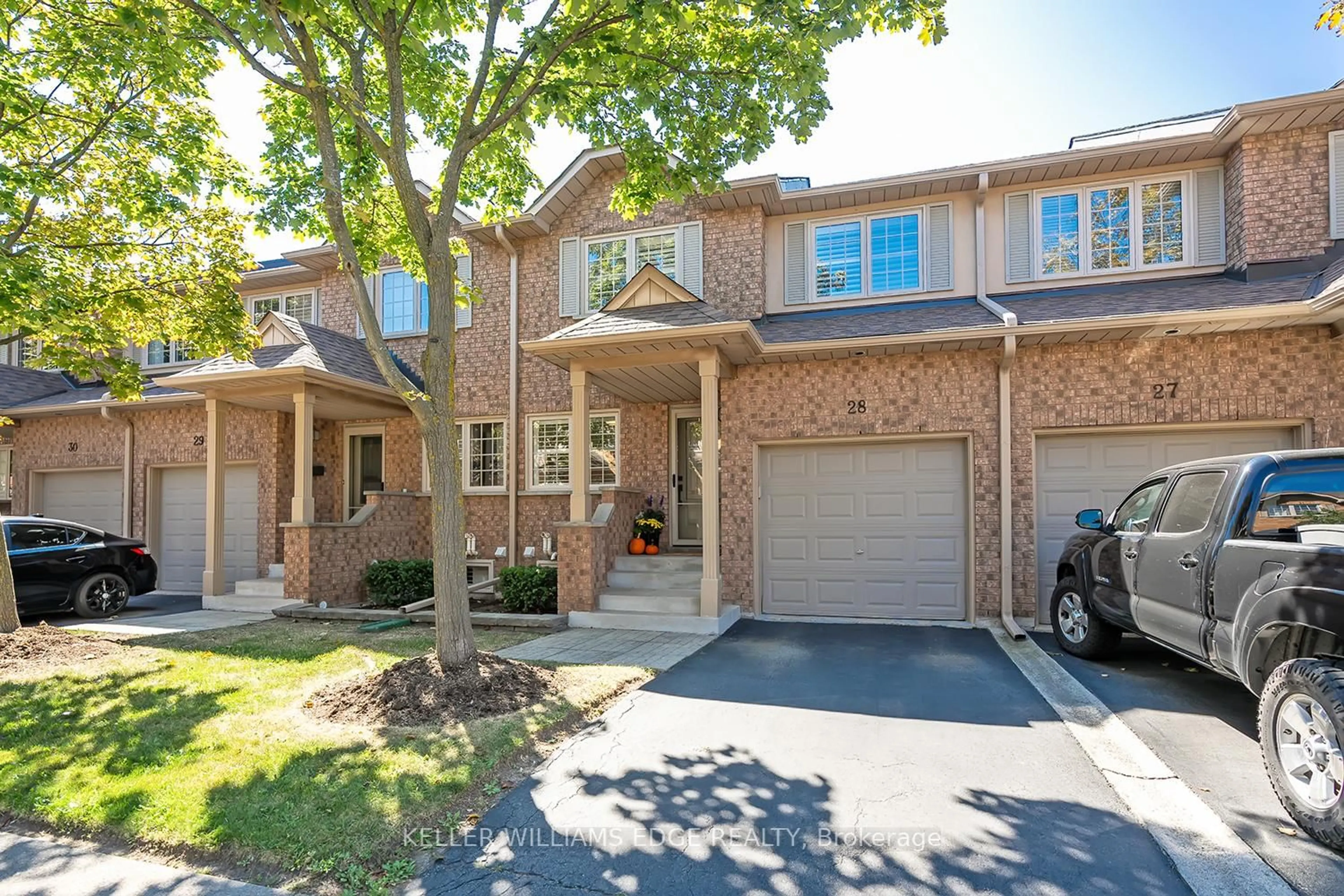 Home with brick exterior material, street for 2880 Headon Forest Dr #28, Burlington Ontario L7M 4H2