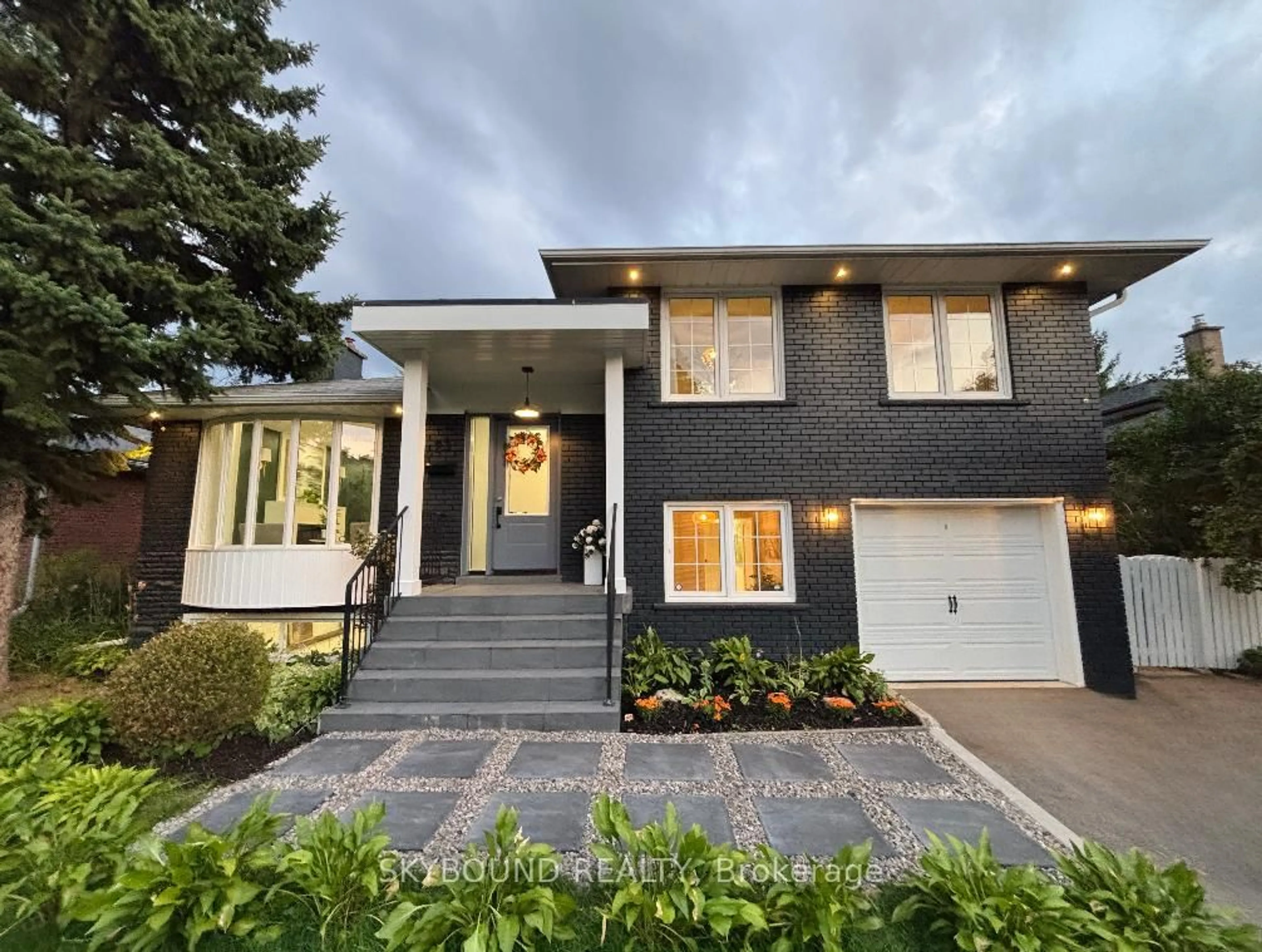 Home with brick exterior material, street for 23 Drury Lane, Toronto Ontario M9P 1P8