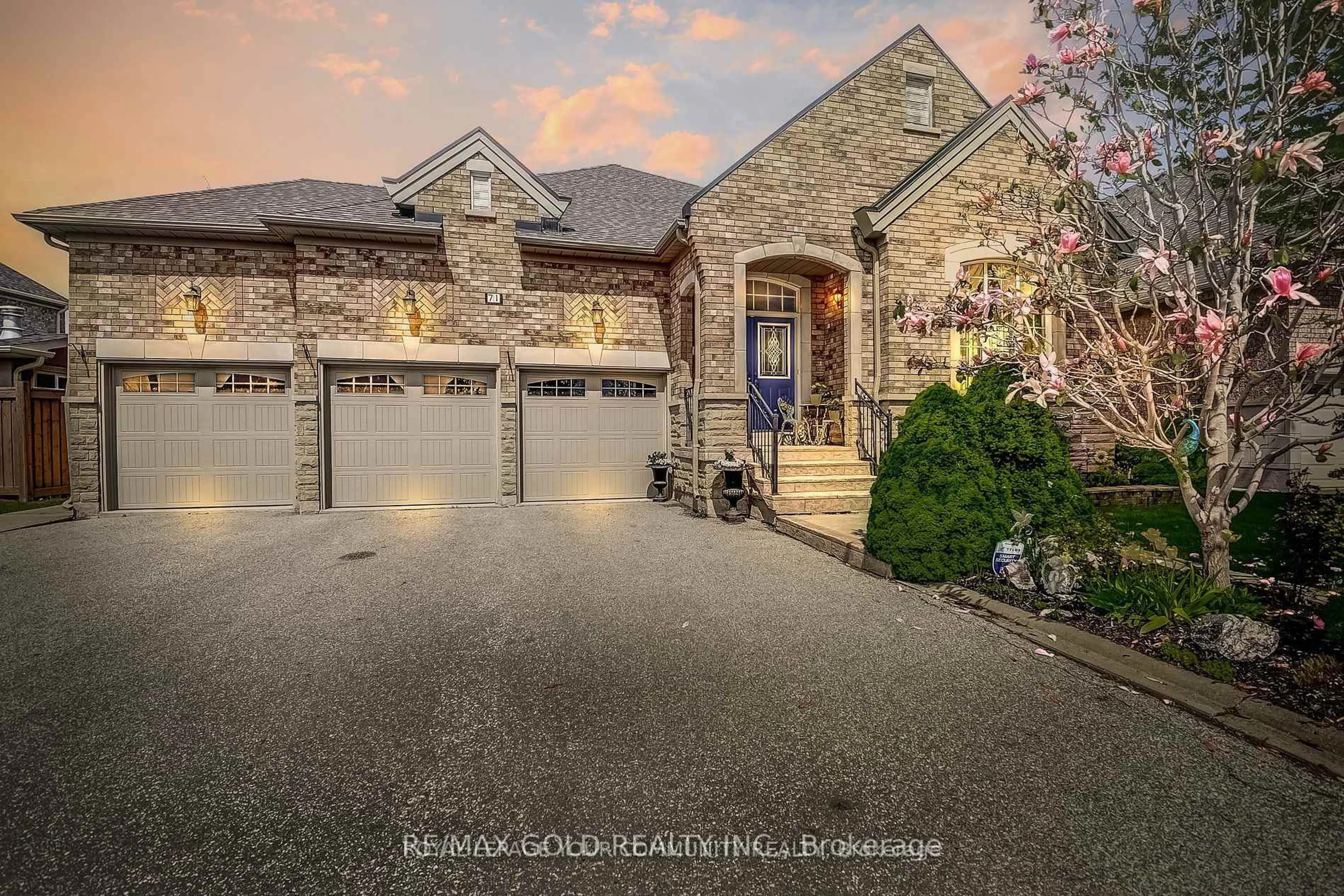 Home with brick exterior material, street for 71 Louvain Dr, Brampton Ontario L6P 1Y9